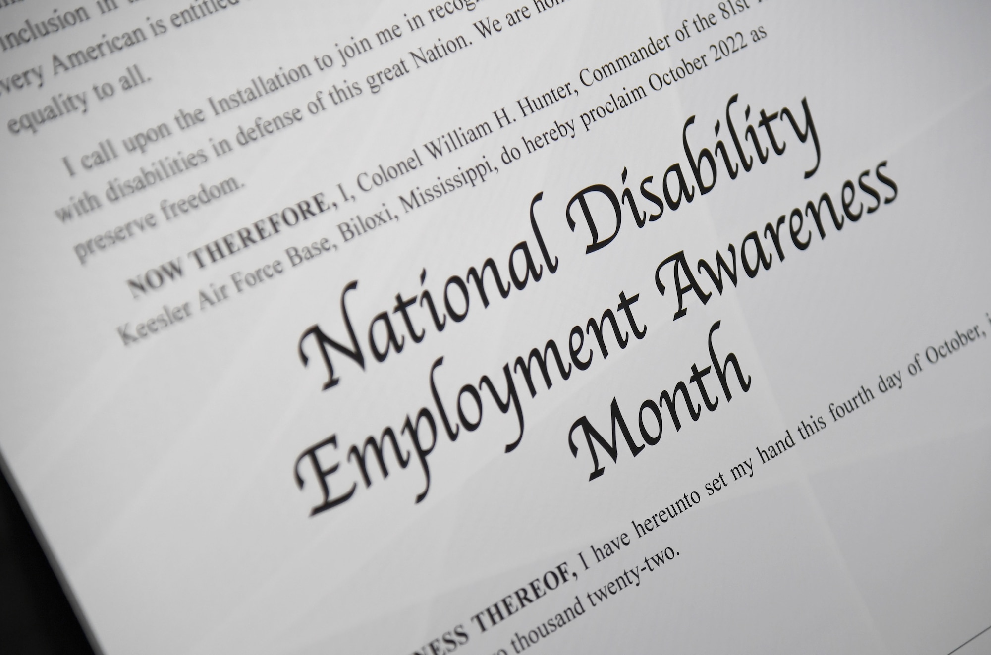 The National Disability Employment Awareness Month proclamation is on display inside the 81st TRW headquarters building at Keesler Air Force Base, Mississippi, Oct. 4, 2022. NDEAM celebrates the contributions of America's workers with disabilities past and present and showcases supportive, inclusive employment policies and practices. (U.S. Air Force photo by Kemberly Groue)
