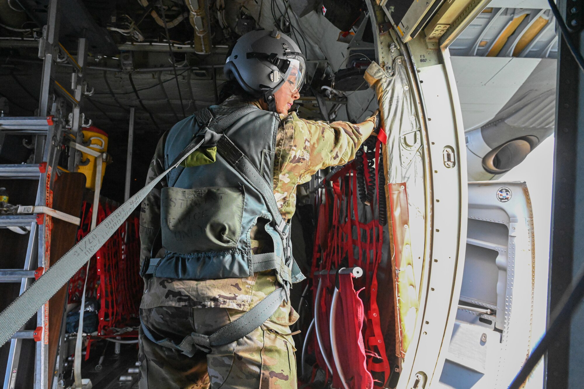 Loadmaster sees the view from a flying plane.