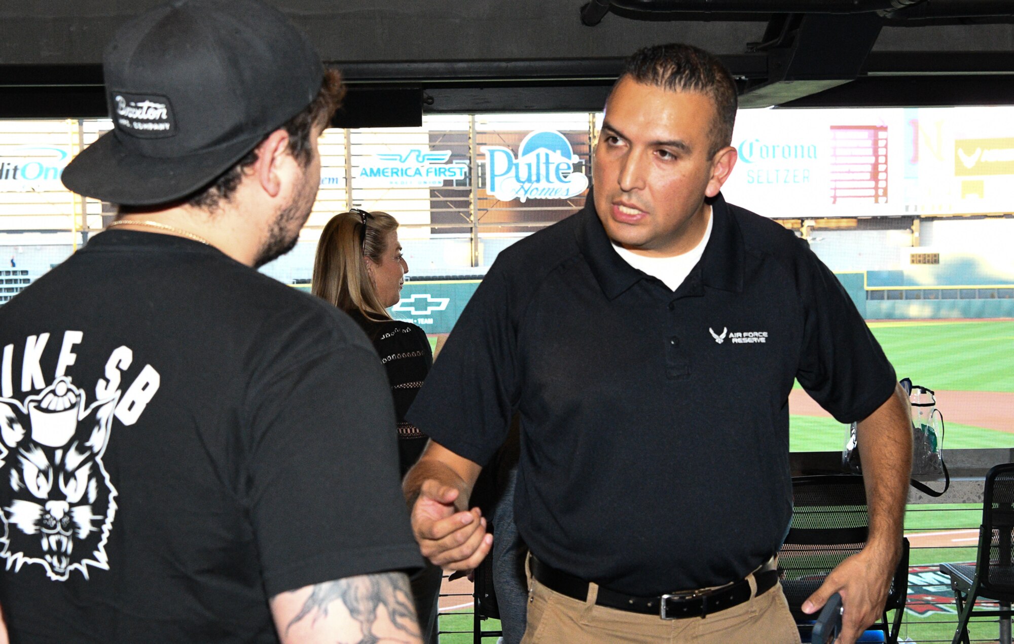 Senior Master Sgt. Gabriel Silva, a Flight Chief for the 353rd Recruiting Squadron talks with a potential recruit.