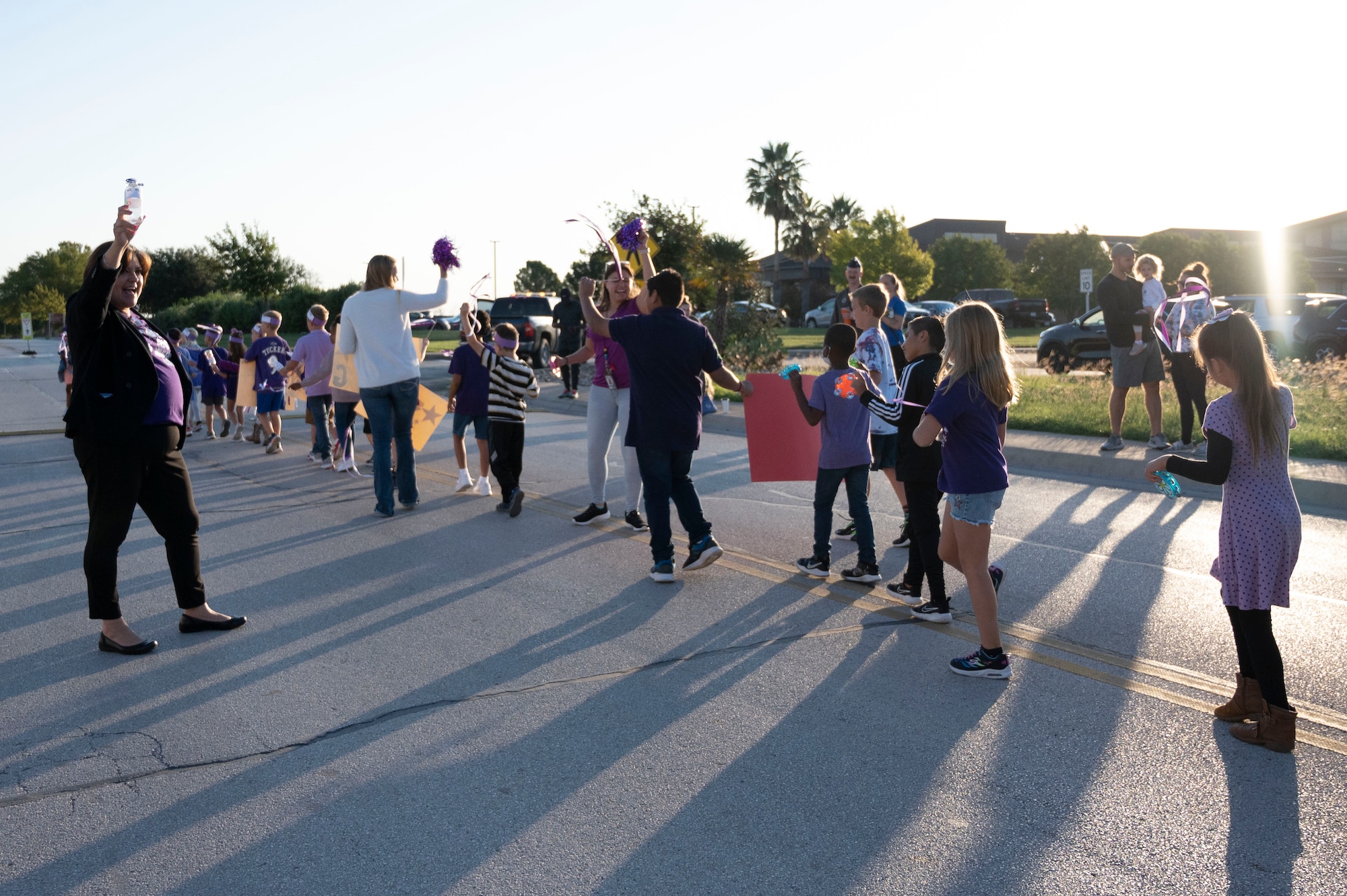 Students and staﬀ from the Roberto Bobby Barrera (RBB) Elementary School walk the “Purple Parade” held at Laughlin Air Force Base, Texas, Sept. 29, 2022. The “Purple Parade” was held in celebration of RBB Elementary School receiving the Purple Star Award, recognizing the support and commitment the school provides to meeting the unique needs of military-connected students and their families. (U.S. Air Force photo by Airman 1st Class Kailee Reynolds)