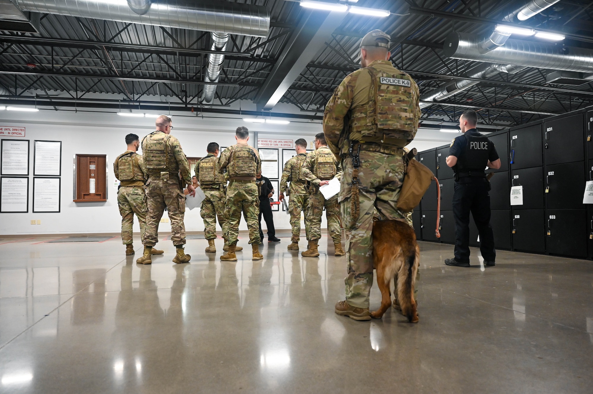 U.S. Air Force Airmen with the 56th Security Forces Squadron receive a briefing prior to beginning their shift Sept. 29, 2022, at Luke Air Force Base, Arizona.