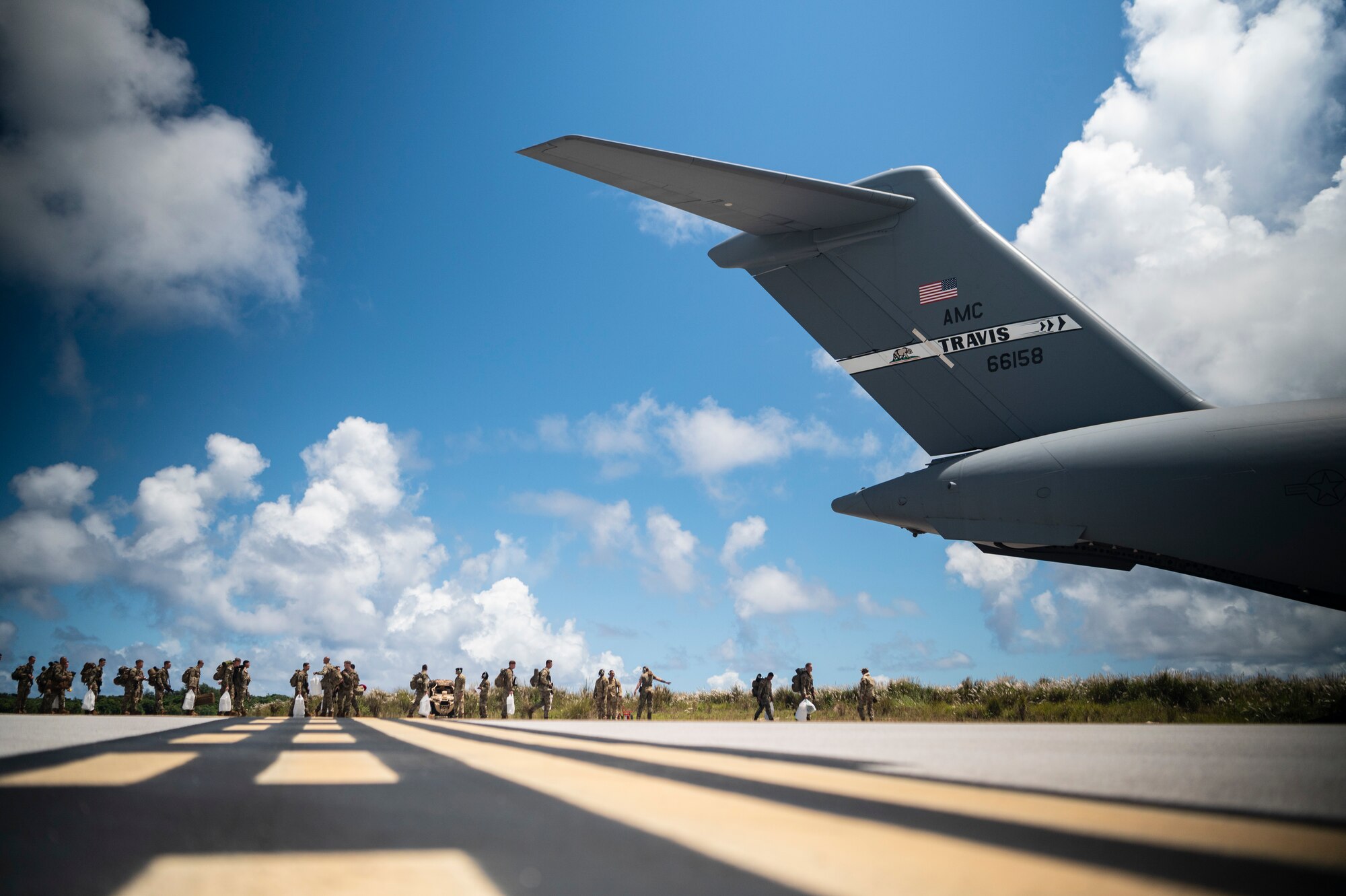 People board a plane