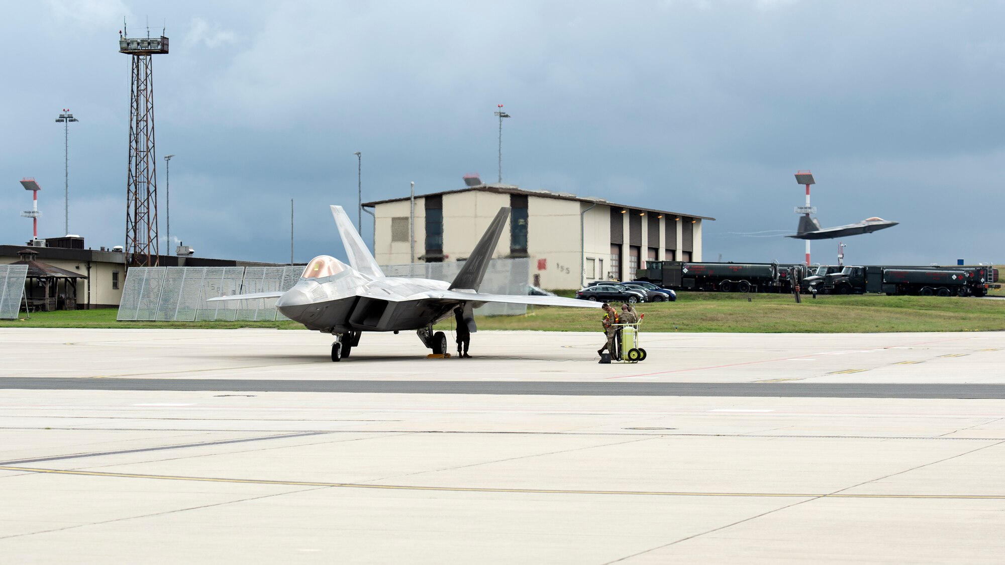 An F-22 Raptor takes off after receiving fuel at Spangdahlem Air Base, Germany.