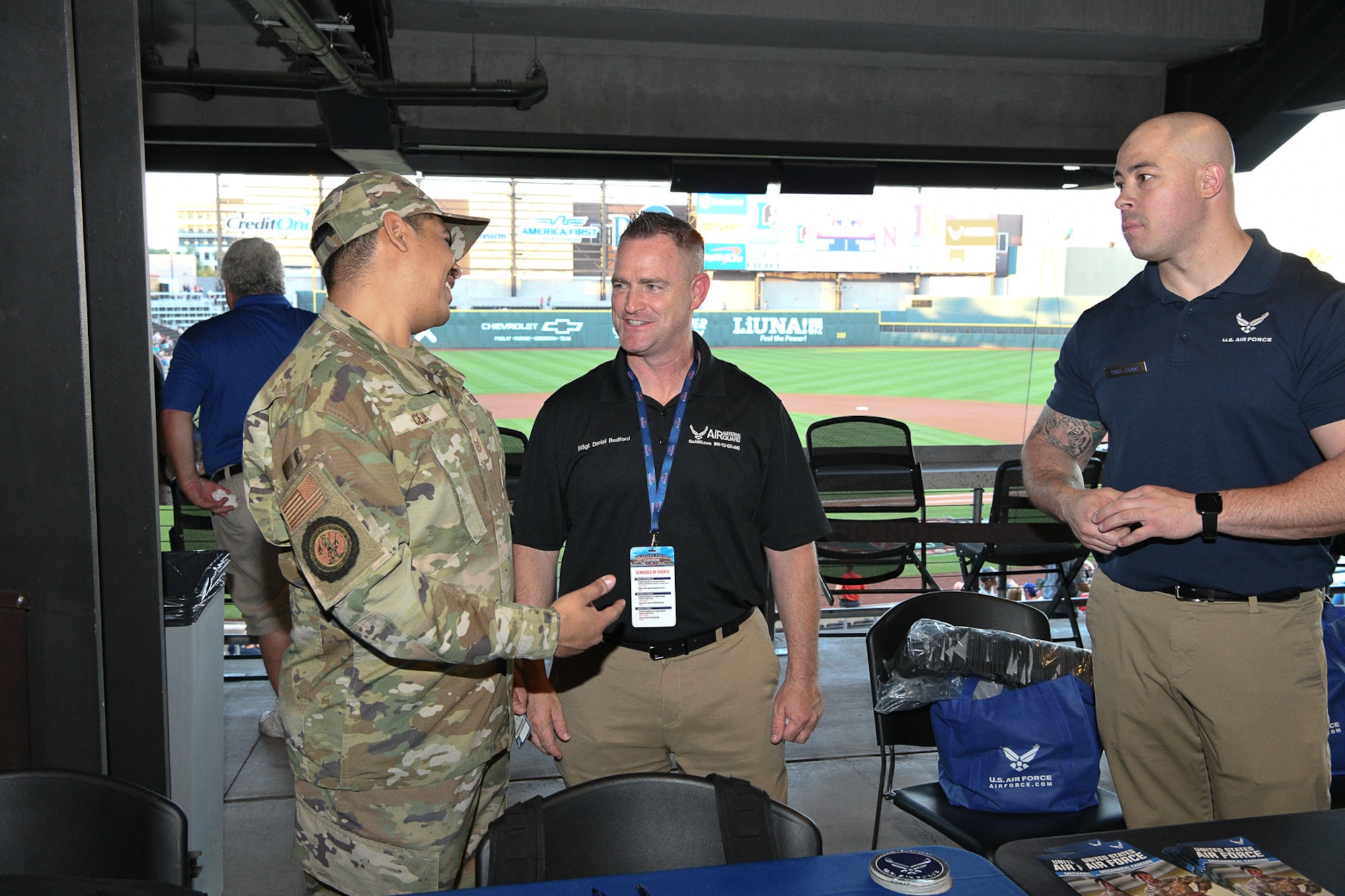 Master Sgt. Daniel Bedford (middle), a program manager for Air Force Recruiting Service’s Marketing Division at Joint Base San Antonio-Randolph talks with Tech. Sgt. Adlai Ceja (left).
