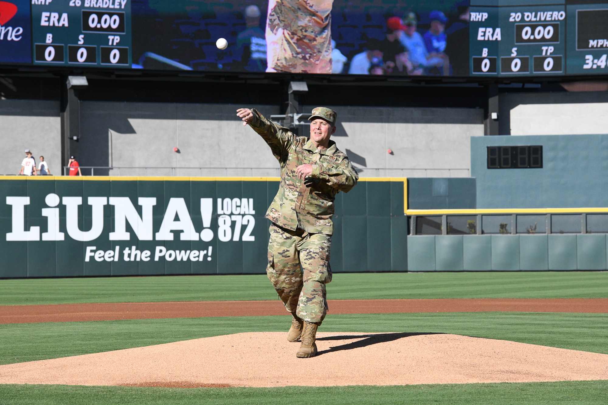 Chief Master Sgt. Joe Edwards, Senior Enlisted Leader of the 726th Operations Group, Creech Air Force Base, Nevada, throws the first pitch at a Minor League Baseball, Triple-A National Championship game inside Las Vegas Ballpark at Summerlin, Nevada, Sept. 30, 2022.