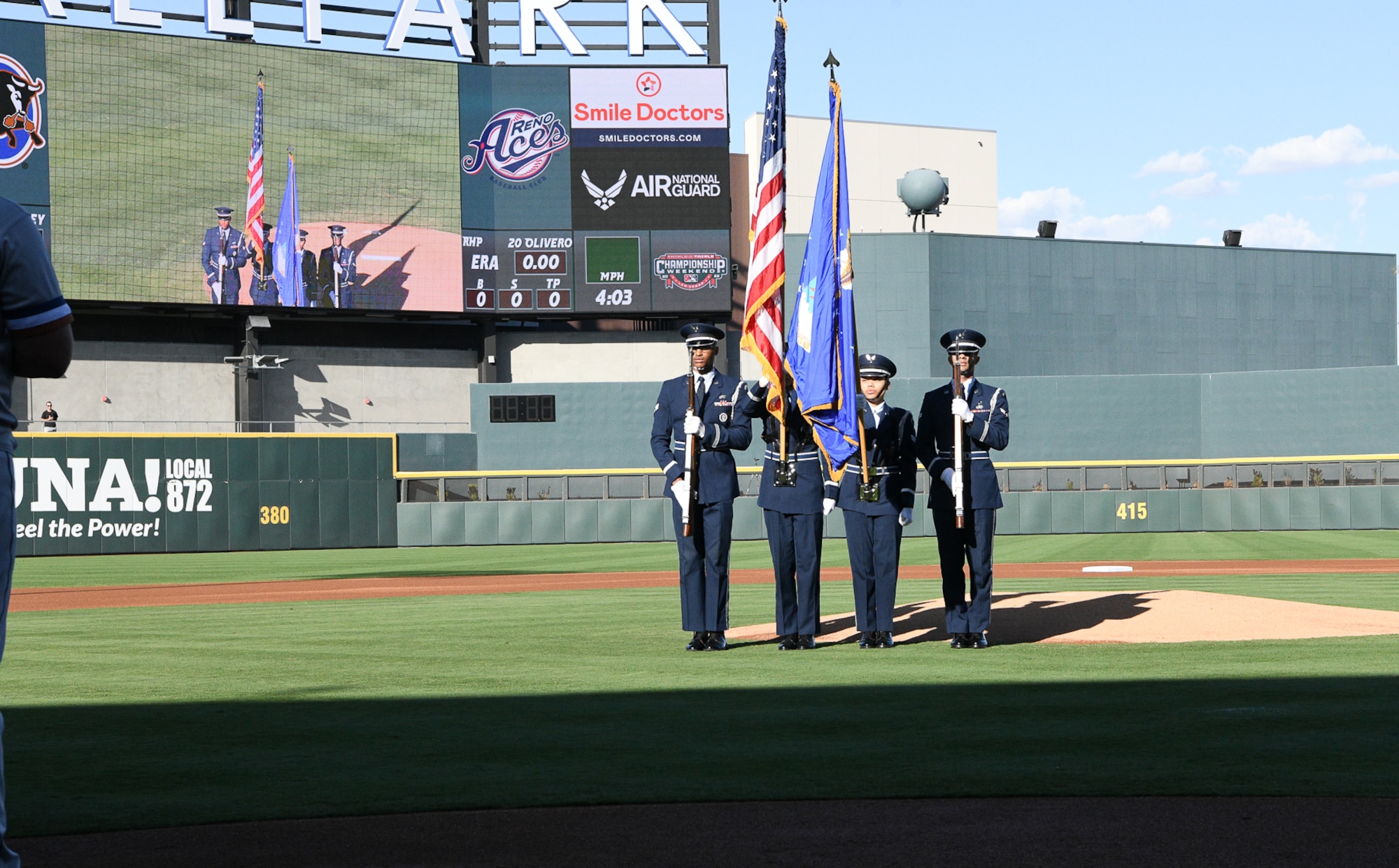 A Nellis Air Force Base Honor Guard presents the colors.