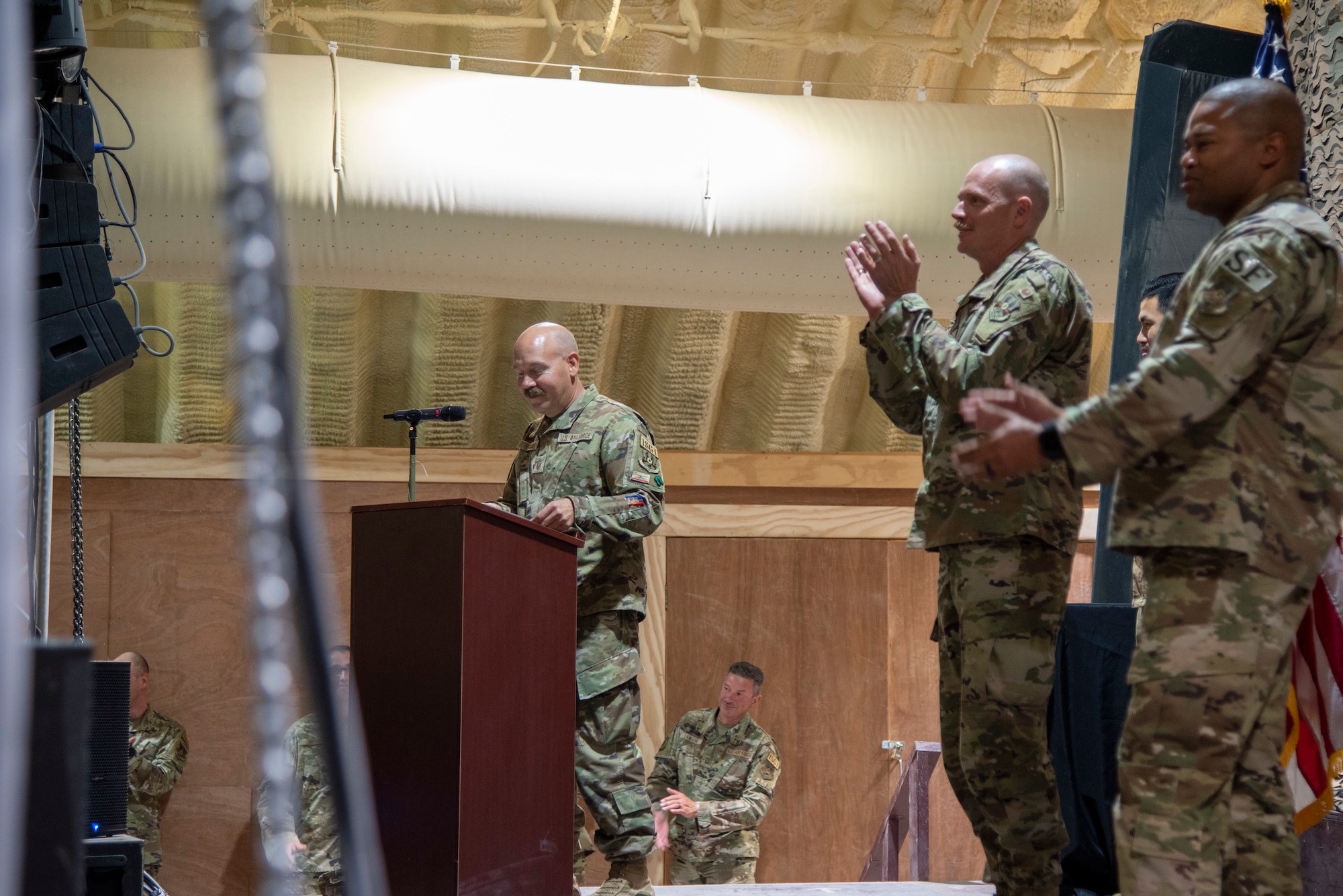 Non-commissioned officers with the 332d Air Expeditionary Wing graduate from First Sergeant Symposium at an undisclosed location in Southwest Asia, Sept 27, 2022. They learned leadership, mental resiliency and other competencies from previous 1st Sgts. and Helping Agency Team members. (U.S. Air Force photo by: Tech. Sgt. Jim Bentley)