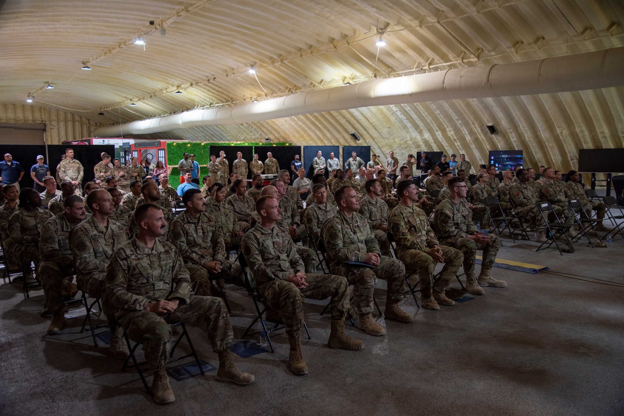 Non-commissioned officers with the 332d Air Expeditionary Wing graduate from First Sergeant Symposium at an undisclosed location in Southwest Asia, Sept 27, 2022. They learned leadership, mental resiliency and other competencies from previous 1st Sgts. and Helping Agency Team members. (U.S. Air Force photo by: Tech. Sgt. Jim Bentley)