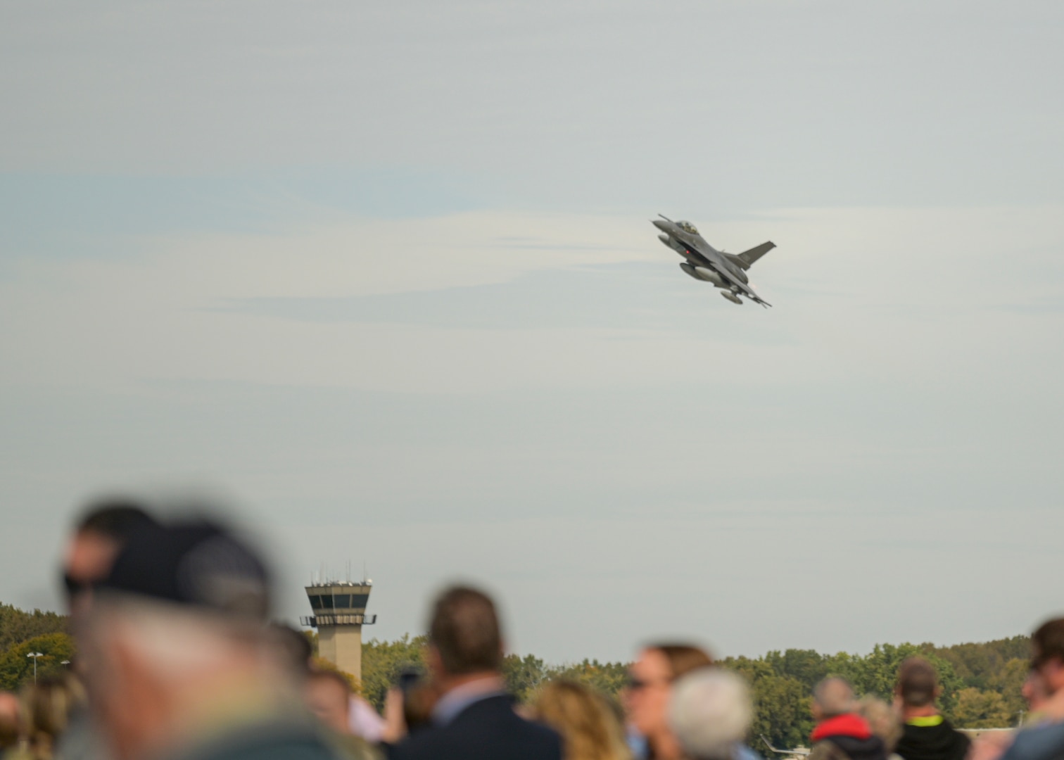 An F-16 Fighting Falcon assigned to the Wisconsin Air National Guard's 115th Fighter Wing overflies Truax Field, Madison, Wisconsin, during a ceremony commemorating the unit's last F-16 to depart Oct. 5, 2022. The F-16 first arrived at Truax Field in 1992 as the eighth primary airframe since the unit's inception in 1948 and is scheduled to be replaced by the F-35 Lightning II aircraft in the spring .