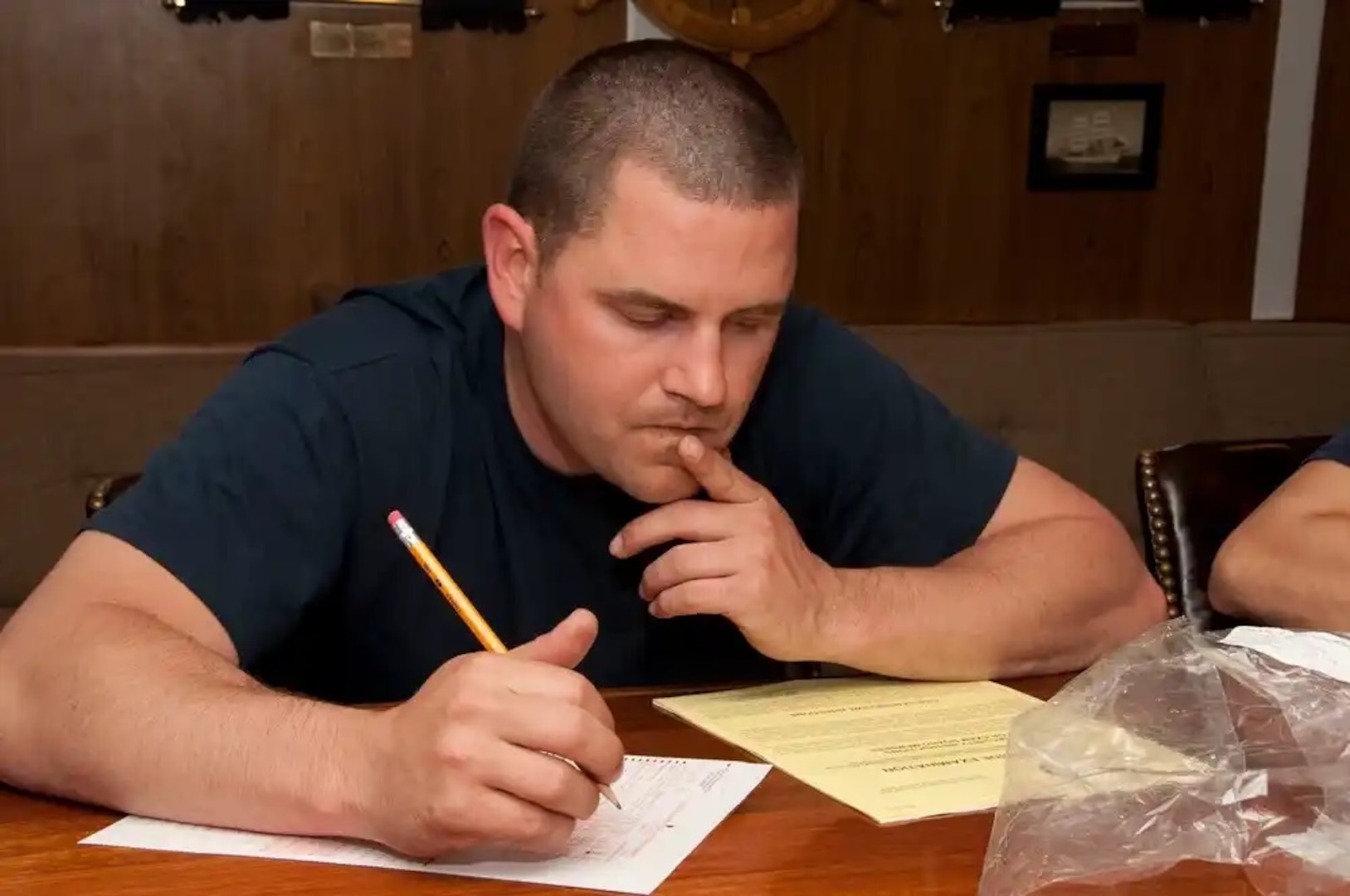 Petty Officer 1st Class Eric Crouse, stationed aboard the U.S. Coast Guard Cutter Eagle participates in the May 2010 Service Wide Examination (SWE) during the Eagle's transit to Puerto Rico Tuesday, May 4, 2010. The SWE is a competition, which certain enlisted rates must take in order to advance based on their raw score, sea time, time in service, time in rank, and award points. U.S. Coast Guard photo by Petty Officer 2nd Class Jetta H. Disco.