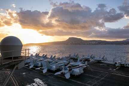 The Nimitz-class aircraft carrier USS George H.W. Bush (CVN 77), along with the embarked staff of Carrier Strike Group 10, arrives in Souda Bay, Crete for a scheduled port visit, Oct. 6, 2022. The George H.W. Bush Carrier Strike Group is on a scheduled deployment in the U.S. Naval Forces Europe area of operations, employed by U.S. Sixth Fleet, to defend U.S., allied, and partner interests.