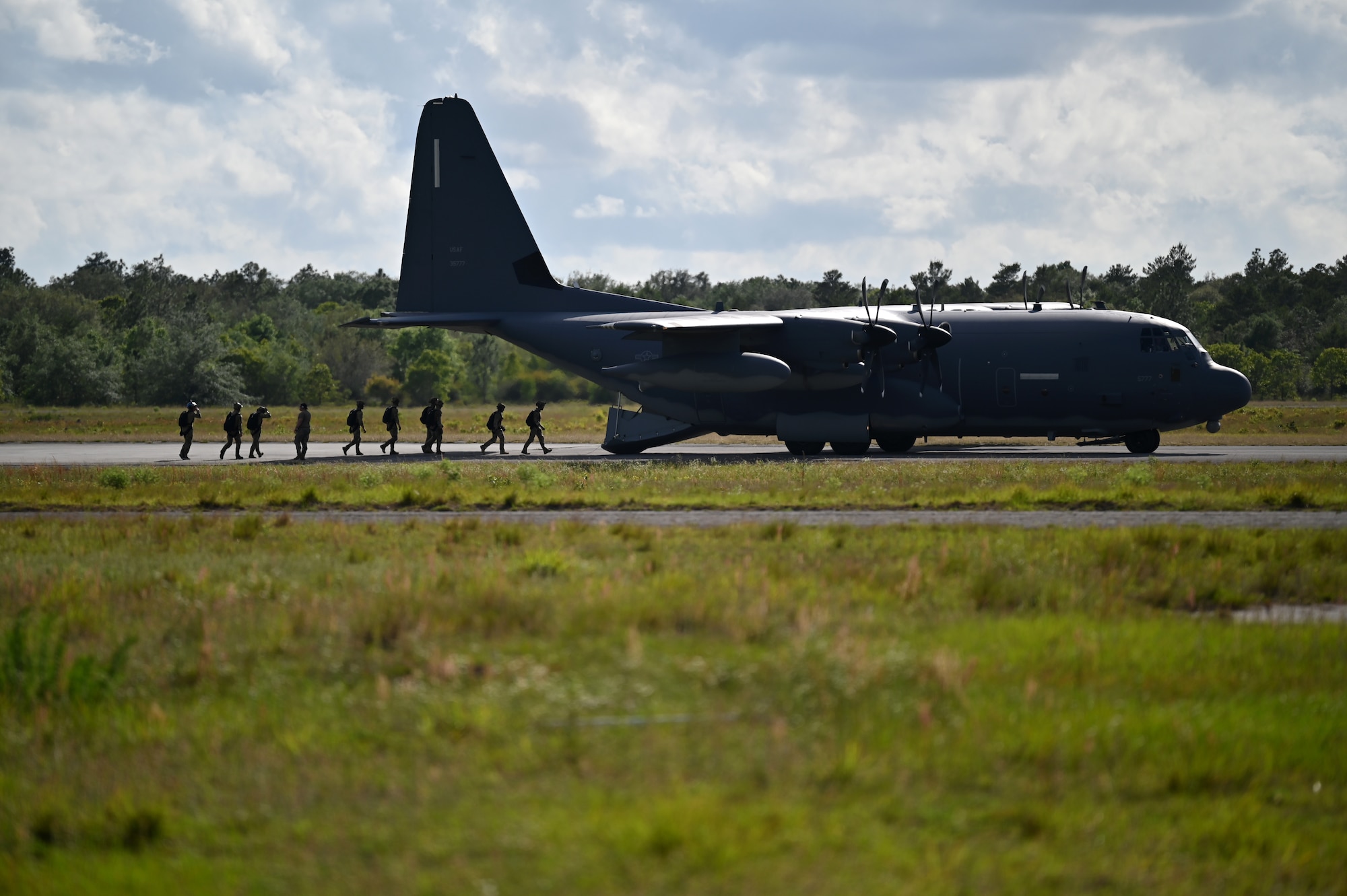 U.S. Air Force Special Tactics operators with the 24th Special Operations Wing, Hurlburt Field, Florida, prepare to conduct a military free fall parachute jump during Emerald Warrior 22.1 near Eglin Range, Florida, May 5, 2022. Emerald Warrior is the largest joint special operations exercise involving U.S. Special Operations Command forces training for response to various threats above and below the threshold of armed conflict, while focusing on U.S. and partner nation relationships and emphasized joint force interoperability.