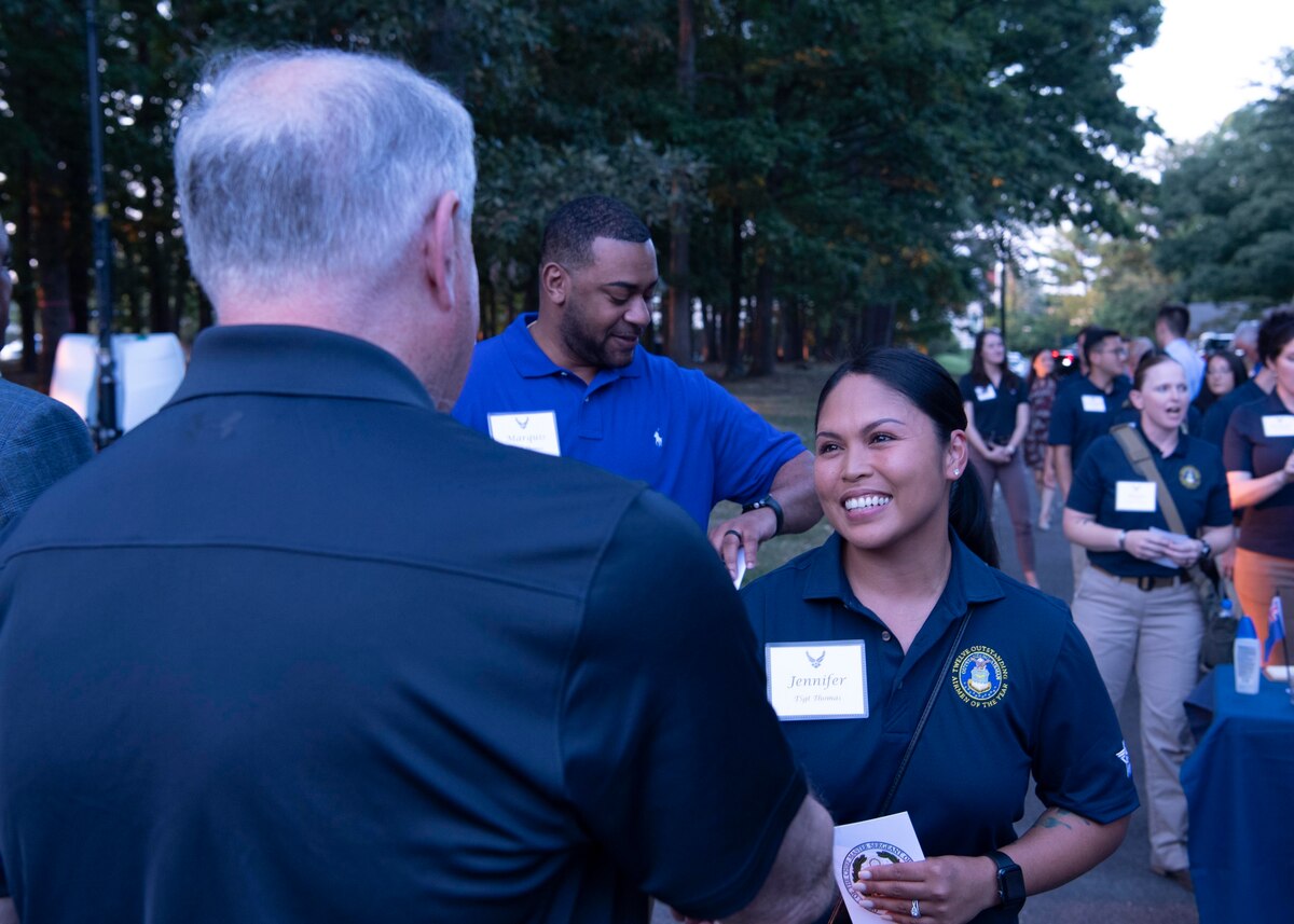 Secretary of the Air Force Frank Kendall greets Tech. Sgt. Jennifer G. Thomas, 2022 Outstanding Airman of the Year representing Air Force Material Command, during the 12 Outstanding Airmen of the Year social at Andrews Air Force Base, Md., Sept. 18, 2022. Thomas was recognized as one of the 2022 12 Outstanding Airmen of the Year based upon superior leadership, job performance and personal achievement. (U.S. Air Force photo by Staff Sgt. Nick Z. Erwin)