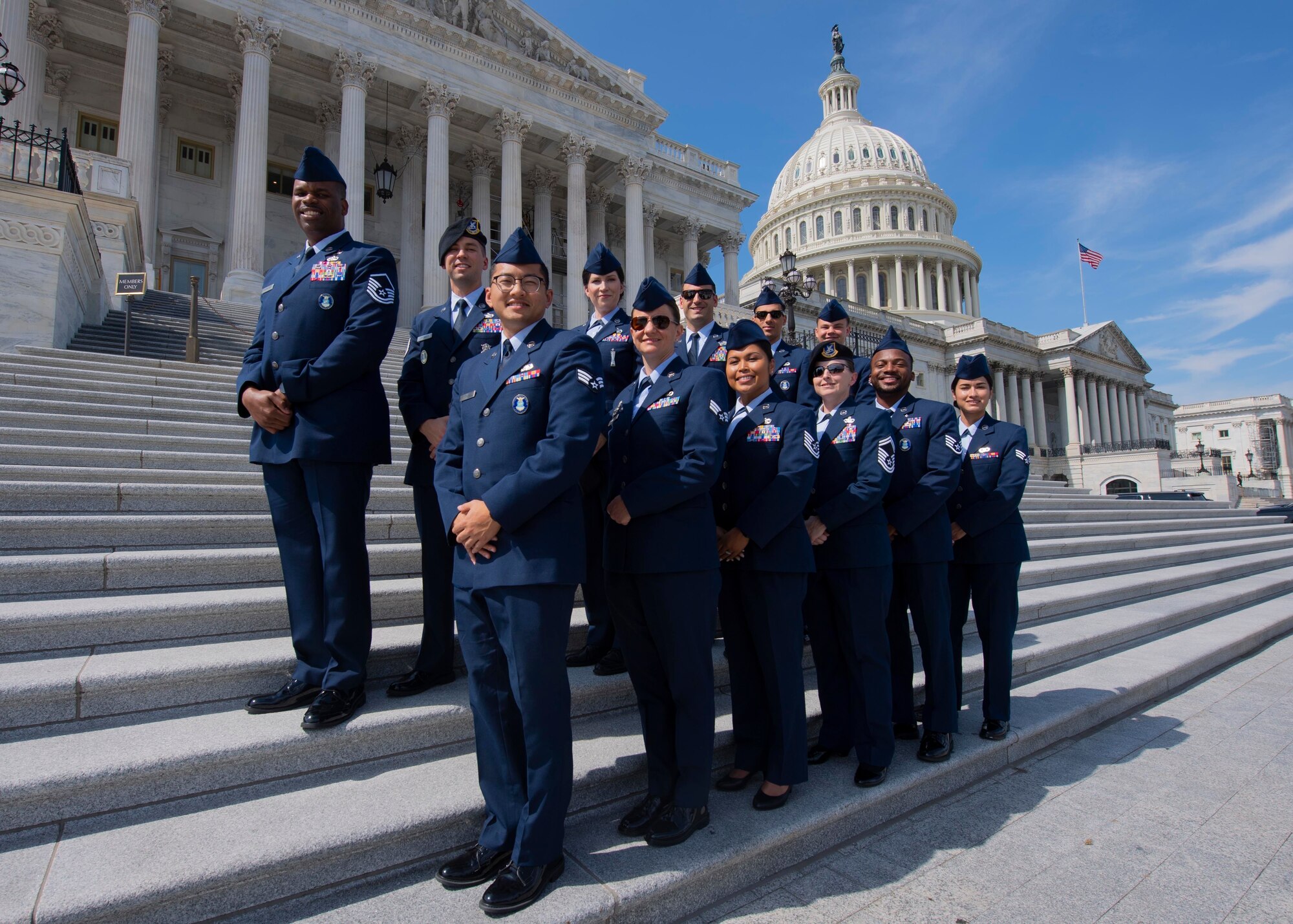 The Air Force’s 2022 12 Outstanding Airmen of the Year pose for a photo in front of the U.S. Capitol Building in Washington, D.C., Sept. 21, 2022. Each awardee was selected based on their superior leadership, job performance and personal achievement. (U.S. Air Force photo by Staff Sgt. Nick Z. Erwin)