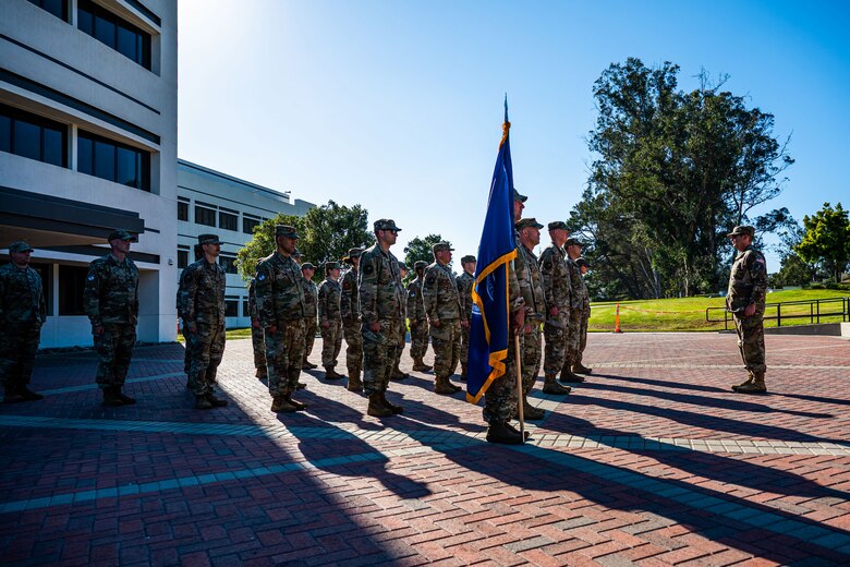 U.S. Space Force Maj. Gen. Douglas A. Schiess, Combined Force Space Component Command (CFSCC) commander, right, commands the CFSCC formation during a retreat ceremony at Vandenberg Space Force Base, Calif., Aug. 31, 2022.