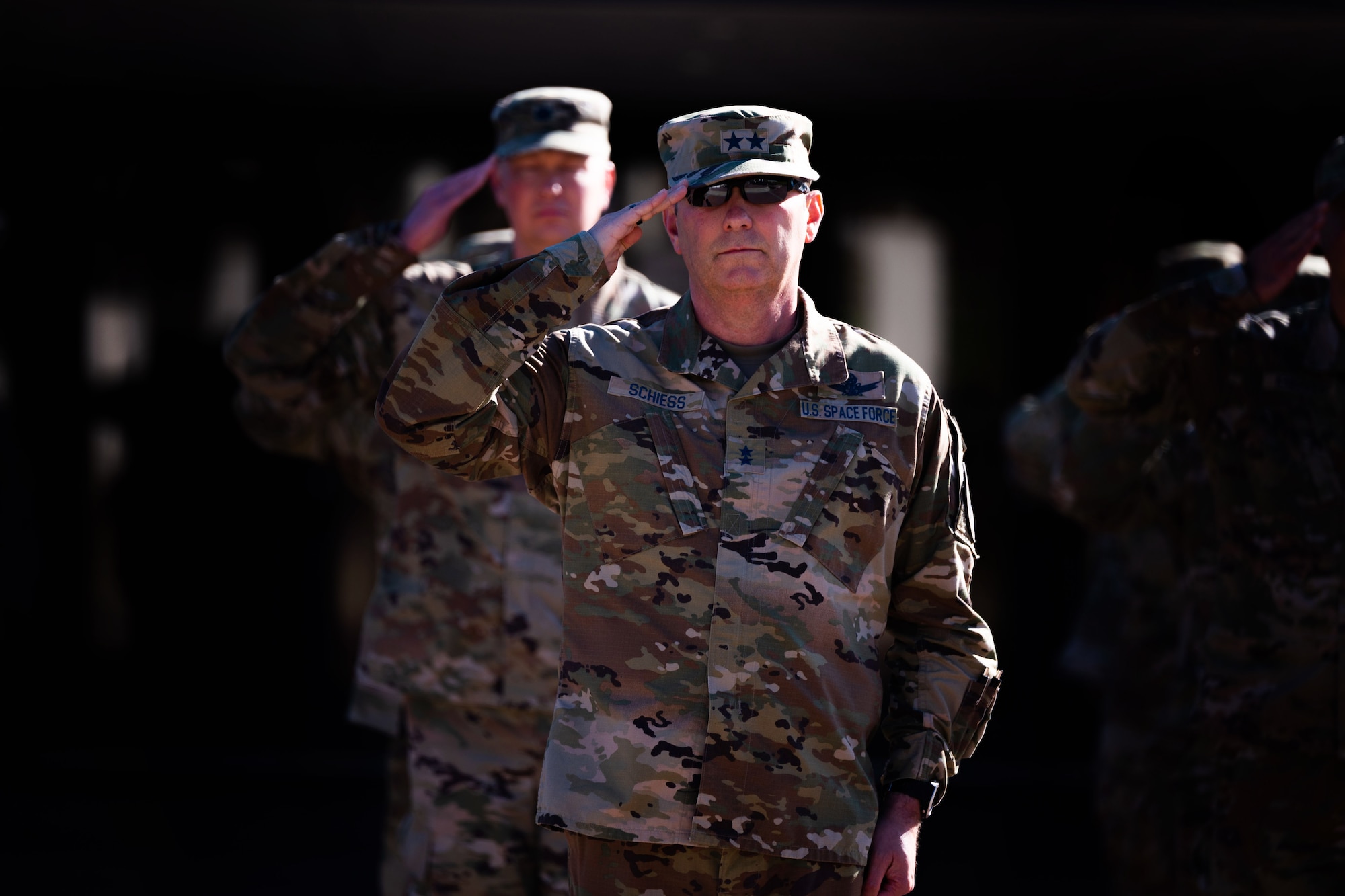 U.S. Space Force Maj. Gen. Douglas A. Schiess, Combined Force Space Component Command (CFSCC) commander, renders a salute during a retreat ceremony at Vandenberg Space Force Base, Calif., Aug. 31, 2022.