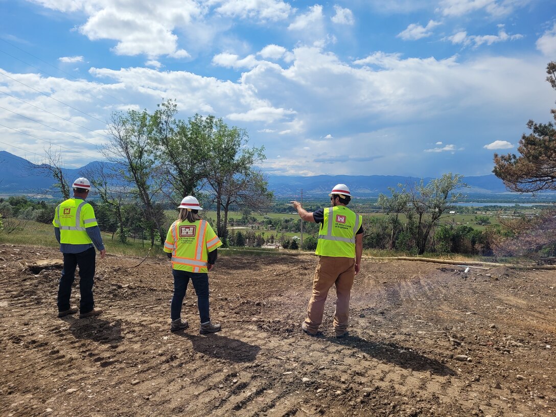 Trudy Templeton (center), a Technical Monitor to the Marshall Fire Debris Removal Mission in Boulder County, Colo., tells Team Leads Mitch Green and Clint Fartini, from the USACE Kansas City District, that one of her assigned properties in Unincorporated Boulder County has been cleared of debris. (courtesy photo)