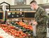 A Marine shops for produce at the Naval Air Station Oceana Commissary in Virginia.