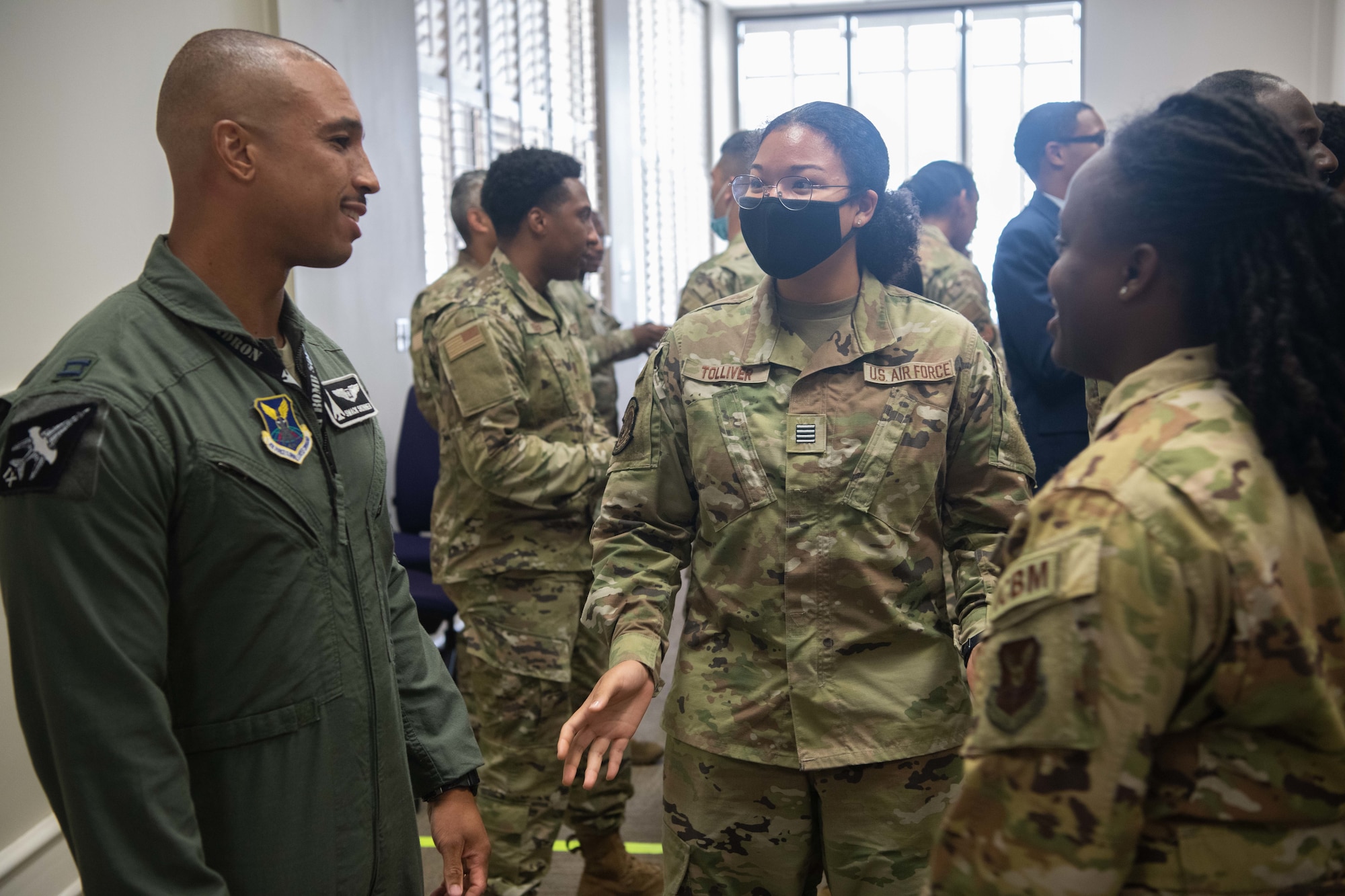 Capt. Malcom Skinner, B-1B bomber weapons system officer, Dyess Air Force Base, Texas, talks with Air Force ROTC cadets at the Historically Black Colleges and Universities mentorship session held Aug. 31, 2022, in conjunction with the Department of the Air Force IT and Cyberpower Conference. The session included several total force and retired Air Force officers and about 40 ROTC and junior ROTC cadets.