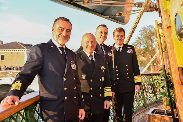 VENICE, Italy (Oct. 6, 2022) Chief of Naval Operations Adm. Mike Gilday (second from left); Chief of the French Navy Adm. Pierre Vandier (second from right); Chief of Italian Navy Adm. Enrico Credendino (left); and Royal Navy First Sea Lord Adm. Ben Key (right) pose for a photo aboard the Italian navy training ship ITS Amerigo Vespucci during the 13th Trans-Regional Seapower Symposium (TRSS), hosted by the Italian Navy. Held every two years, TRSS provides a forum for international Naval leaders, organizations and agencies from more than 50 nations to discuss the latest developments in confronting maritime challenges. (U.S. Navy photo by Cmdr. Courtney Hillson/released)