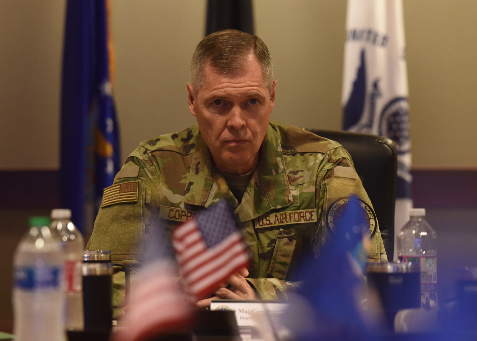 Maj. Gen. Douglas Coppinger, Central Security Service deputy chief, receives the 17th Training Wing mission brief at Goodfellow Air Force Base, Texas, September 9, 2022. Coppinger discussed the vision for the wing's future and the steps to achieve the wing's goals. (U.S. Air Force photo by Airman 1st Class Zachary Heimbuch)