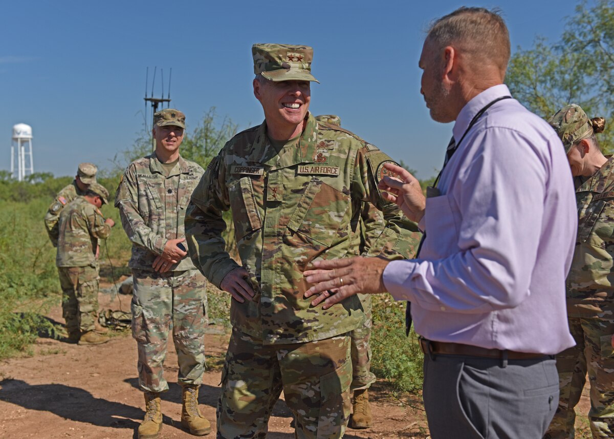 Maj. Gen. Douglas Coppinger, Central Security Service deputy chief, tours Forward Operating Base Sentinel at Goodfellow Air Force Base, Texas, September 9, 2022. FOB Sentinel serves as the stage for the 344th Military Intelligence Battalion’s signals intelligence capstone exercise, where students apply skills learned throughout their training in a simulated combat environment. (U.S. Air Force photo by Airman 1st Class Zachary Heimbuch)