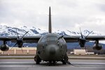 A Royal Air Force C-130J assigned to the No. 47 Squadron from RAF Brize Norton, England, sits on the flightline during RED FLAG-Alaska 22-1 at Joint Base Elmendorf-Richardson, Alaska, May 4, 2022. Approximately 2,220 service members from three nations participate in flying, maintaining and supporting more than 90 aircraft from over 25 units during this iteration of the exercise. RF-A enables joint and international units to train together to improve combat skills in a controlled environment.