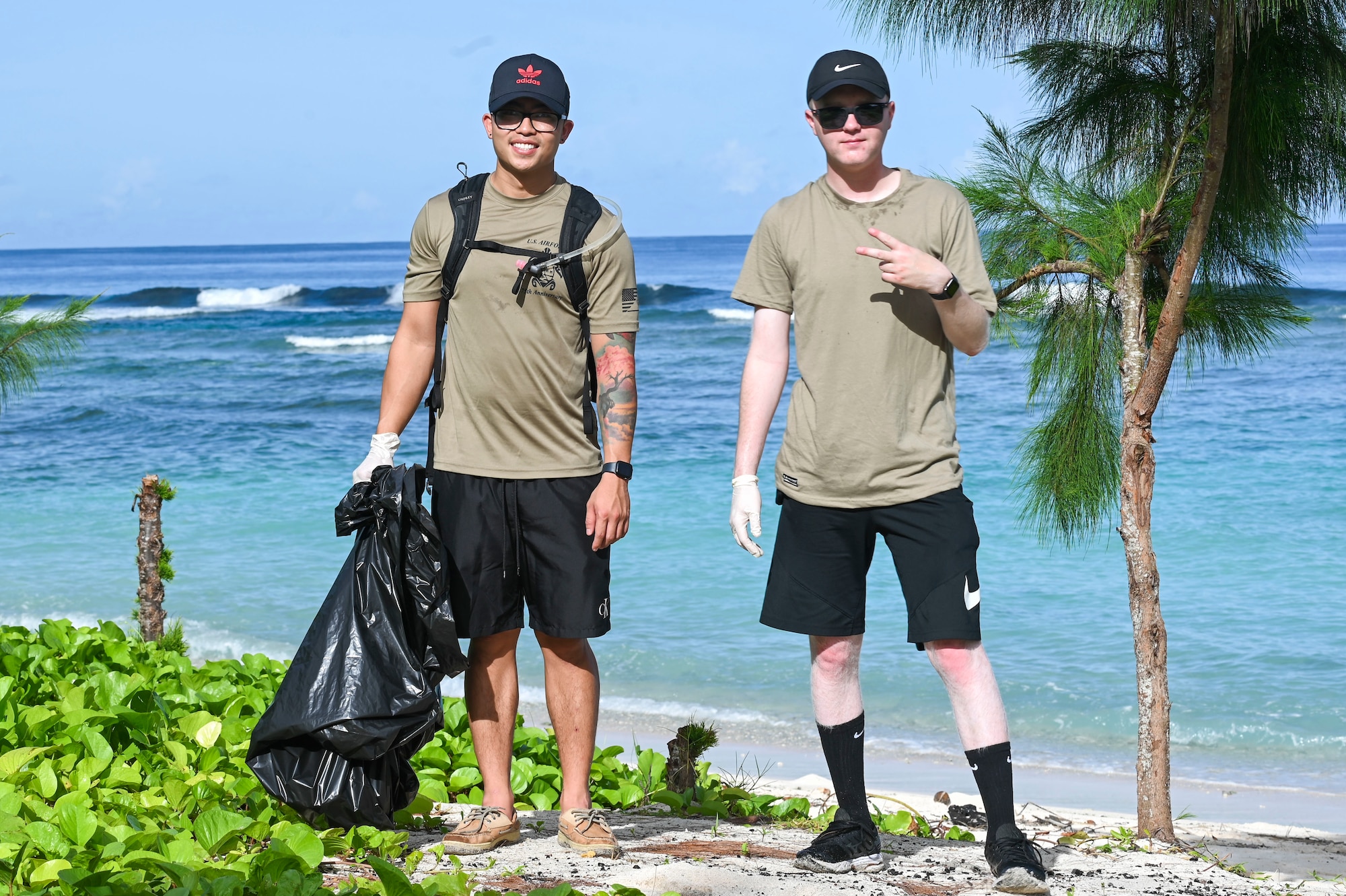 Two Airmen pose for a photo.
