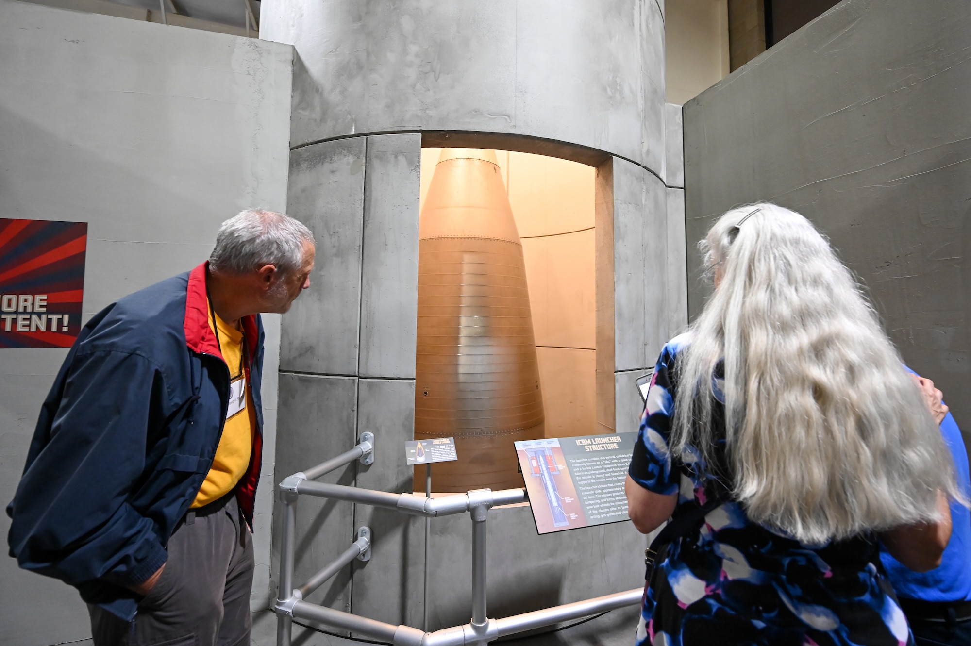 Visitors view the Hill Aerospace Museum's newest exhibit.