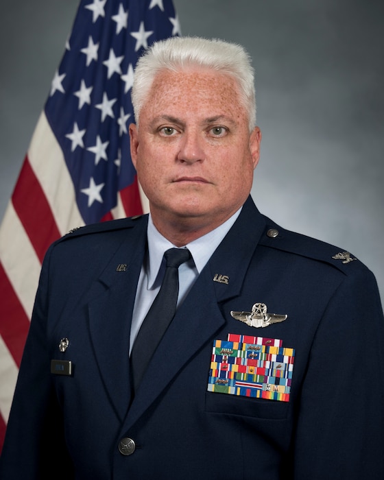 a man poses for a photo