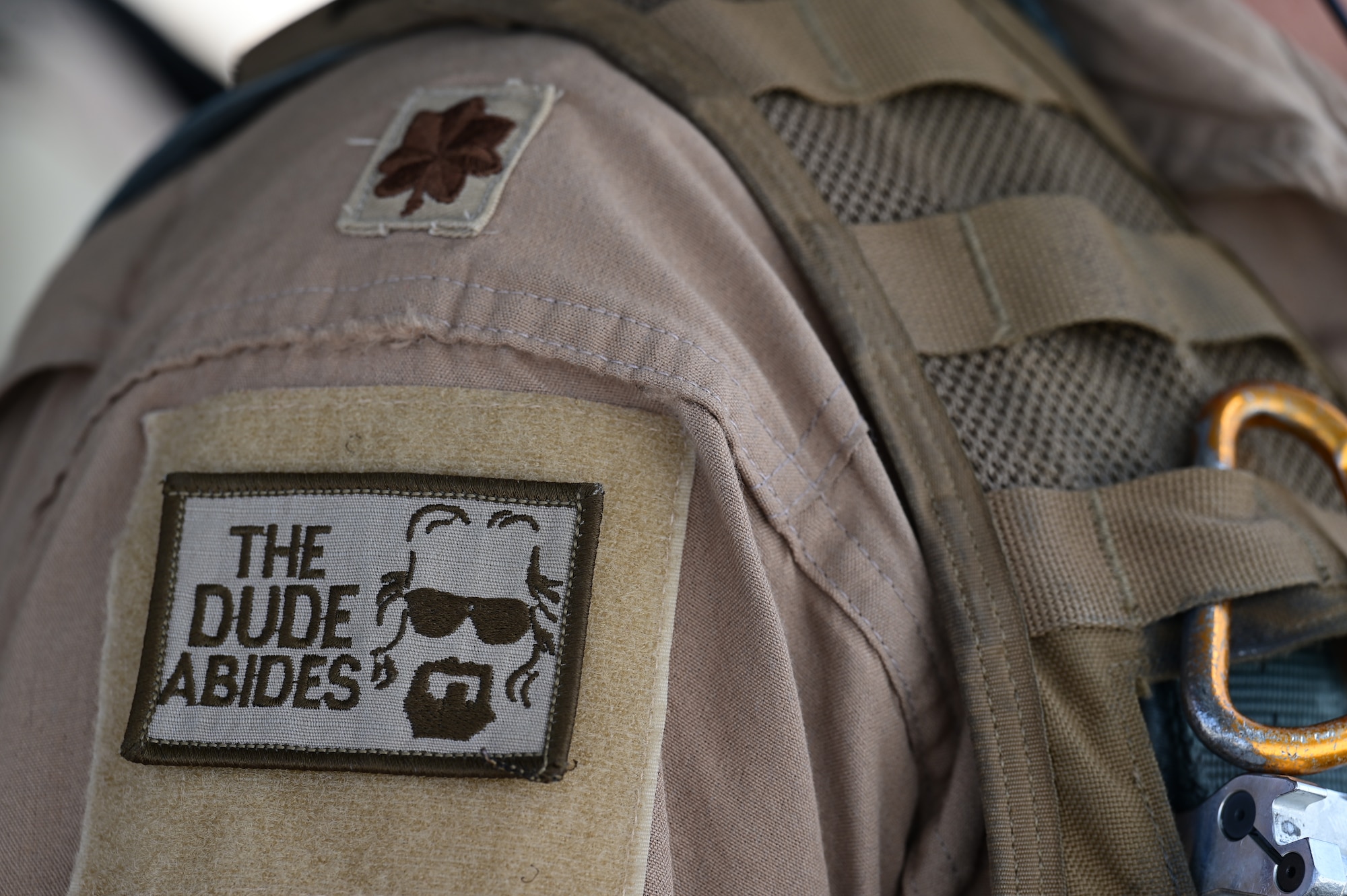 A U.S. Air Force pilot with the 335th Expeditionary Fighter Squadron displays his morale squadron patch at an undisclosed location in Southwest Asia, Sept. 27-28, 2022. The 335th EFS is prepared to deploy at a moment’s notice anywhere in the world to provide an assortment of air-to-ground weapons with pinpoint precision. (U.S Photo by Staff Sgt. Ashley Sokolov)