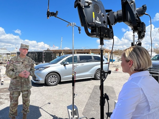 Col. James Booth, U.S. Army Corps of Engineers Jacksonville District commander, greets Lt. Gen. Scott Spellmon, commanding general of the U.S. Army Corps of Engineers and 55th chief of engineers.  Spellmon toured damaged areas of Fort Myers Beach.