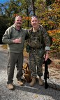 Retired Marine Corps Col. Randy Hoffman, left, accompanied recently retired Col. Kirk Mullins during his last 20-mile ruck march in the Marine Corps. Hoffman marched 19-miles alongside Mullins, who reserved the last mile for his grandson. Hoffman and Mullins stopped to toast and remember two of their fellow Marines, 2nd Lt Shawn Coll and Lieutenant Col. Bret Hart, who have passed away.