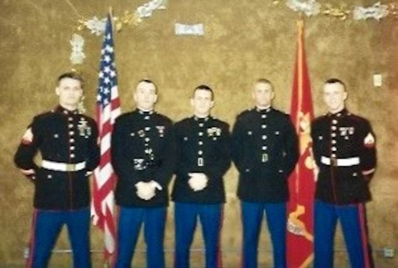 Col. Kirk Mullins, second from left, is pictured above at his commissioning ceremony in Richmond, Ind., in Dec. 1993. Mullins was commissioned as a Marine Corps officer in 3/24 Company K alongside his three best friends, 2Lt. Shawn Coll, Cpl. Bret Hart and Sgt. Randy Hoffman. Mullins retired from the U.S. Marine Corps after 31 years of faithful service on Sept. 29, 2022, at a ceremony at Marine Corps Base Quantico’s 395-acre Transportation Demonstration Support Area.