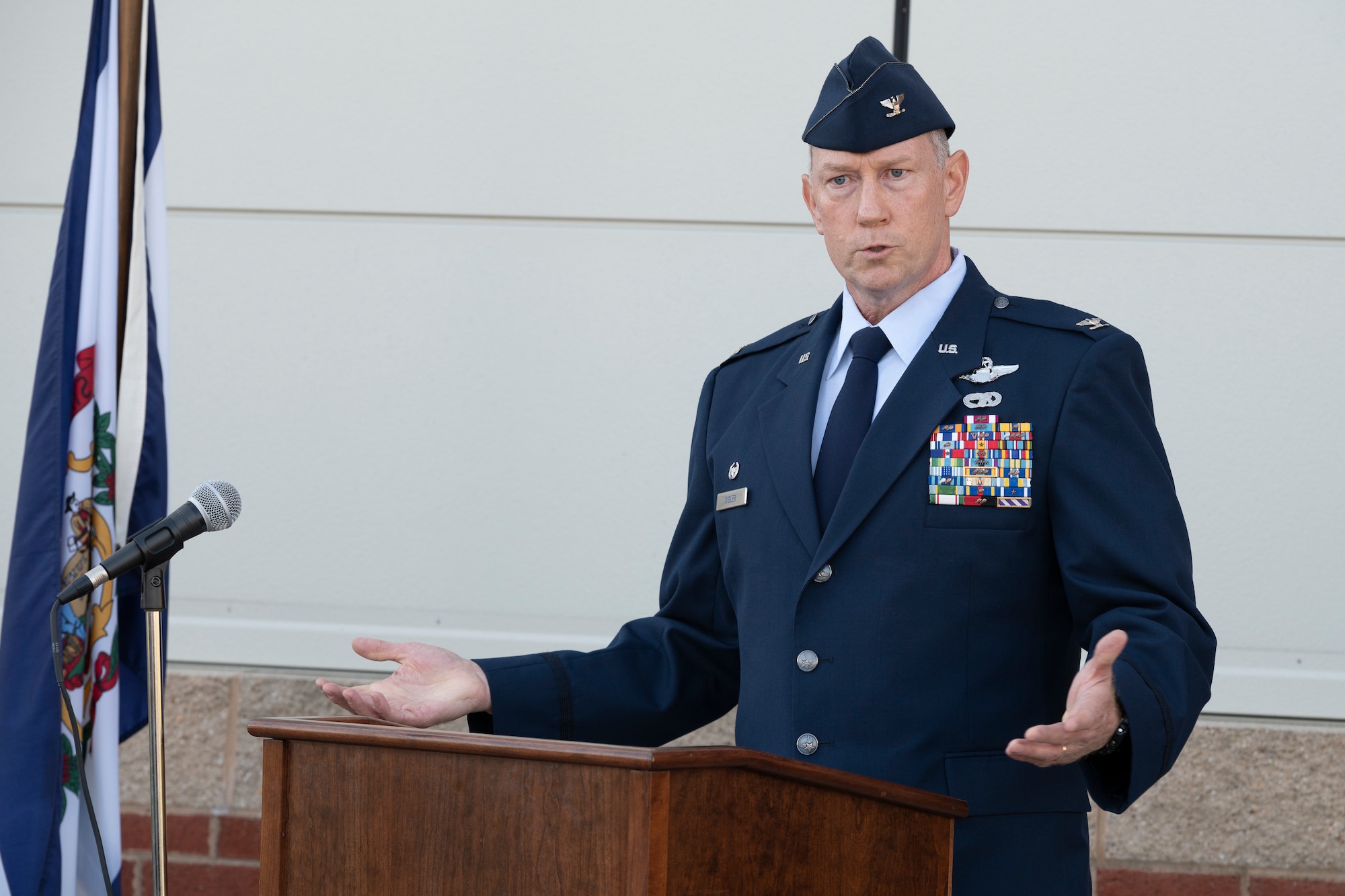 U.S. Air Force Col. Christopher Sigler, speaks during a ceremony to honor the crew of Decoy 81, who lost their lives in an aircraft crash 30 years ago. The ceremony was held in front of the 167th Operations Group building at the 167th Airlift Wing, Martinsburg West Virginia, Oct. 7, 2022.