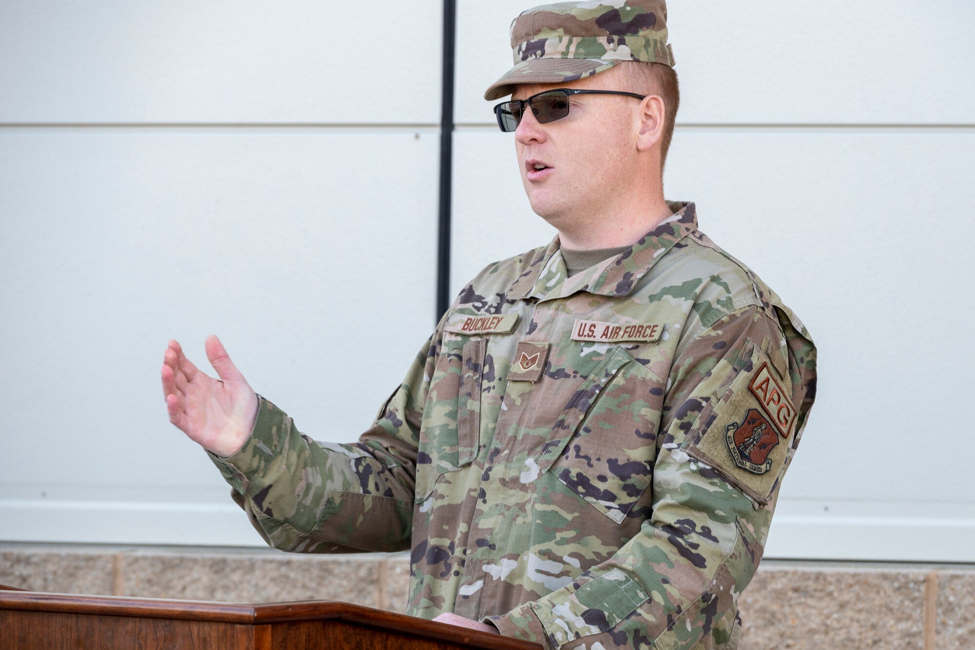 Staff Sgt. George Buckley, a crew chief for the 167th Aircraft Maintenance Squadron, speaks during the Decoy 81 memorial ceremony held at the 167th Airlift Wing, Oct. 7, 2022.