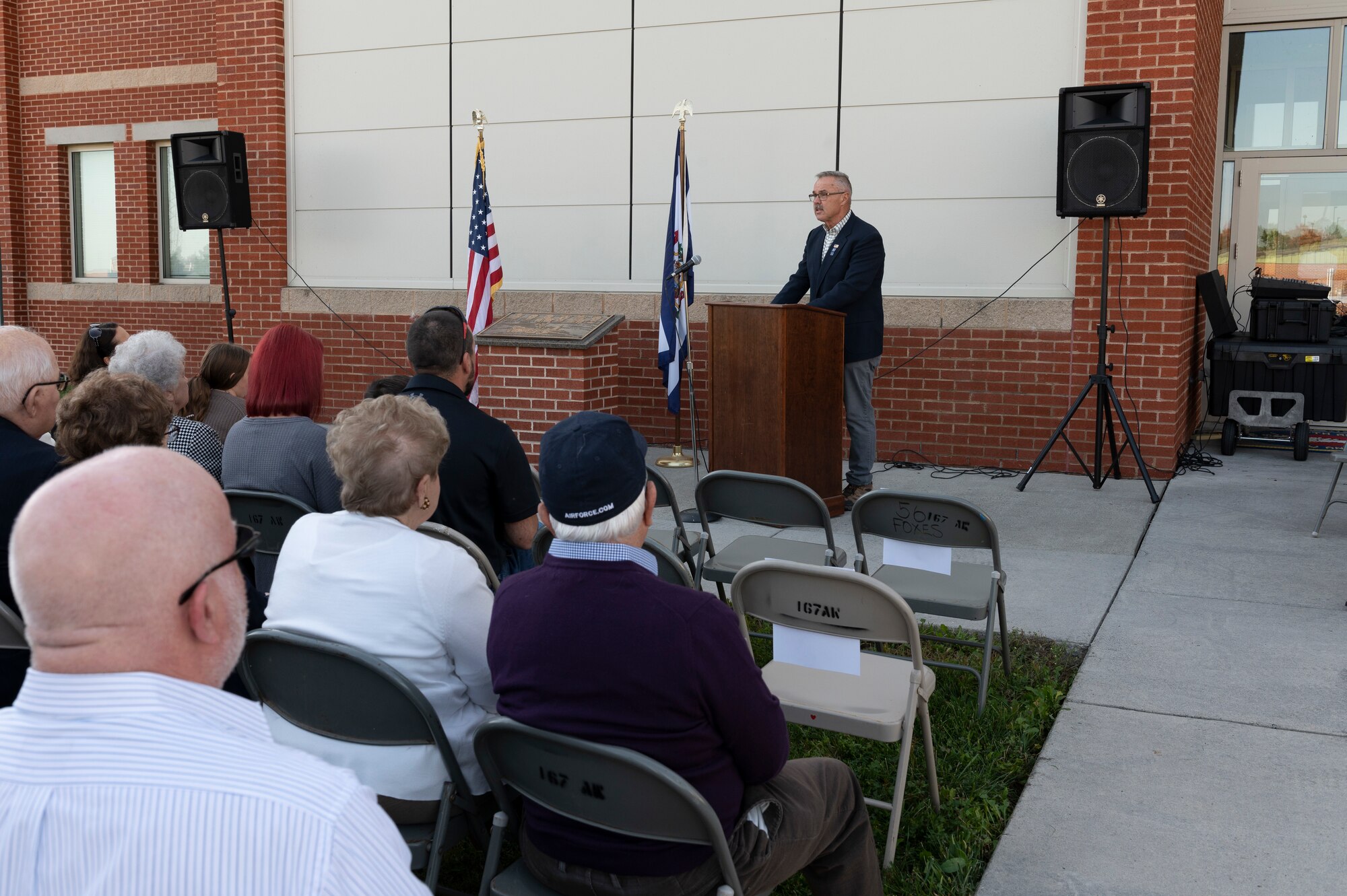 Retired Chief Master Sgt. Roland Shambaugh speaks during the Decoy 81 memorial ceremony held at the 167th Airlift Wing, Oct. 7, 2022.