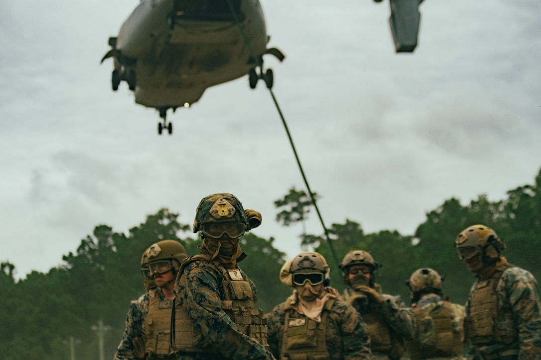 U.S. Marines with Maritime Special Purpose Force (MSPF), 26th Marine Expeditionary Unit (MEU) conduct Helicopter Rope Suspension Techniques (HRST) Masters' course at Stone Bay, on Marine Corps Base Camp Lejeune, North Carolina, Sept. 29, 2022. HRST prepares Marines for helicopter-borne insertion and extraction operations as well as certifies Marines as HRST Masters allowing them to oversee HRST operations with their respective units. The HRST Masters’ Course is one of several Expeditionary Operations Training Group (EOTG) taught courses that the Marines and Sailors of the MEU receive as they prepare to deploy next year. (U.S. Marine Corps photo by Cpl. Michele Clarke)