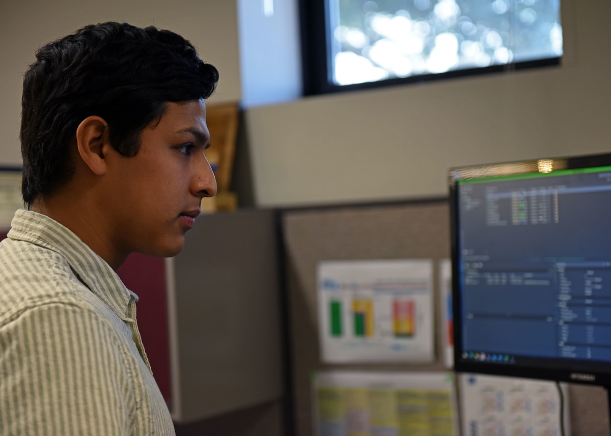 Rafael Mendoza, 17th Civil Engineer Squadron mechanical engineer, focuses on his computer screen at Goodfellow Air Force Base, Texas, Oct. 4, 2022. Mendoza’s duties as a 17th CES mechanical engineer include designing buildings and fire trainers for the 17th Training Wing. (U.S. Air Force photo by Airman 1st Class Sarah Williams)