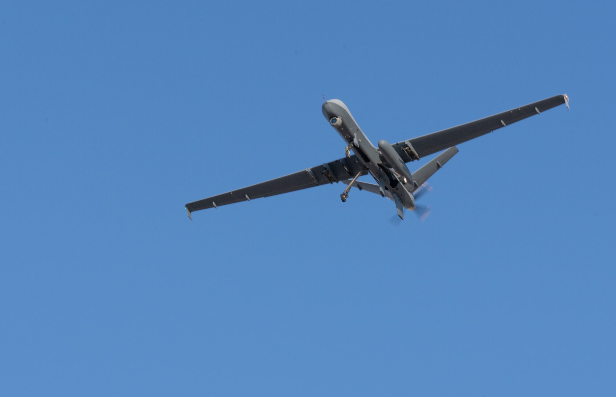 A MQ-9 Reaper performs an Automatic Takeoff and Landing Capability (ATLC) during a training exercise designed around Agile Combat Employment, at an undisclosed location in Southwest Asia, September 27-28, 2022. The MQ-9 with the ATLC can be operated globally to provide to provide air support anytime, anywhere. (U.S Air Force by Tech Sgt. Melissa Isidro)