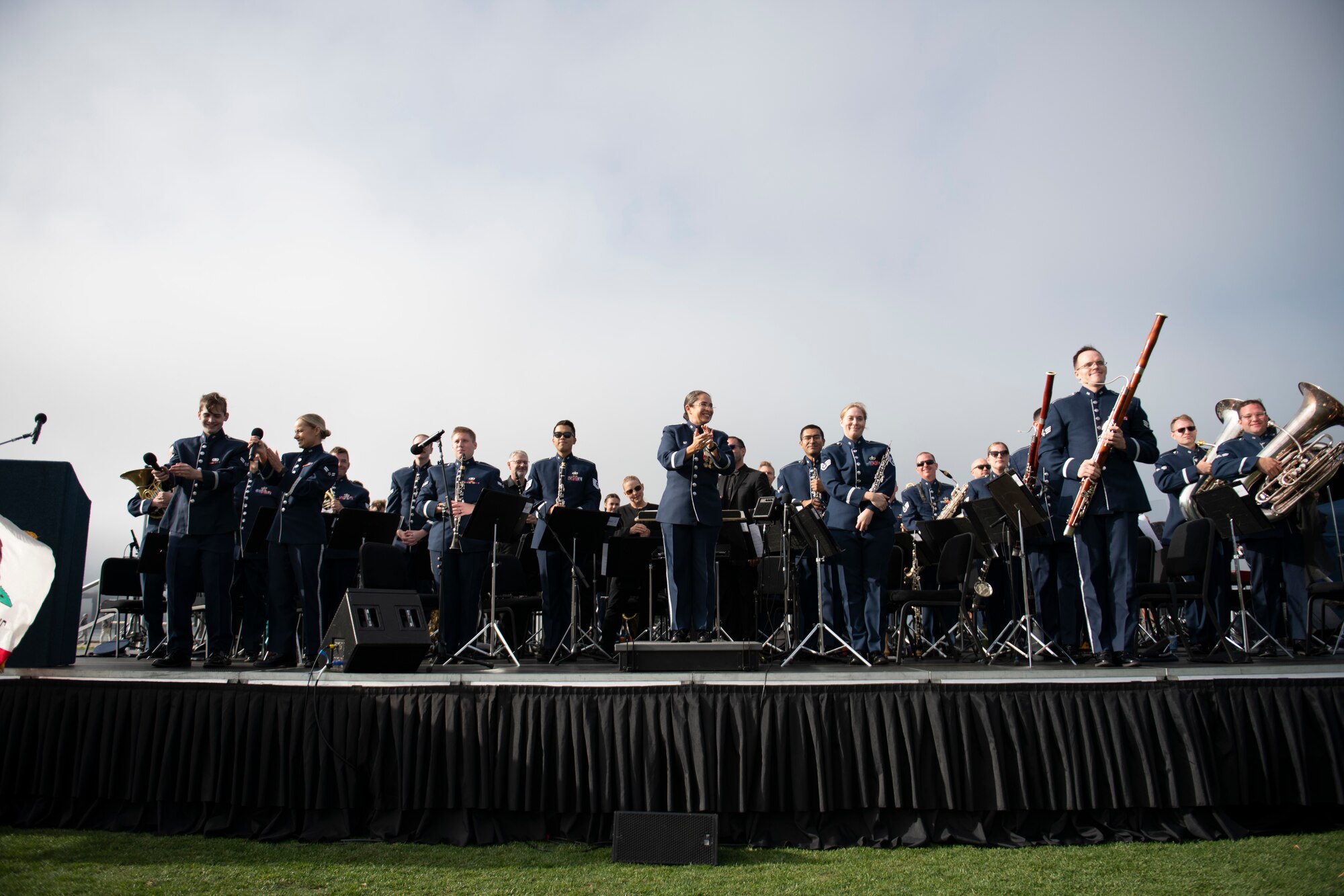 The U.S. Air Force Band of the Golden West from Travis Air Force Base, California, stands after completing their concert performance at the Presidio Tunnel Tops, San Francisco, California, Oct. 6, 2022.
