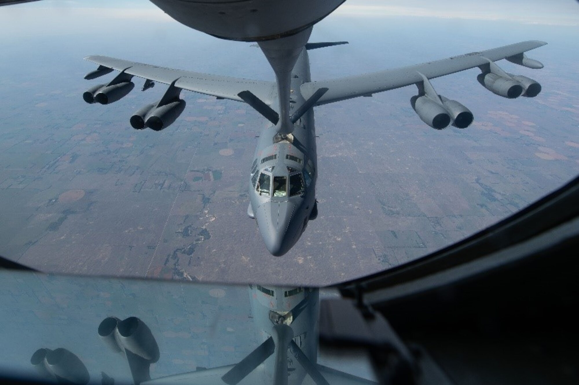 A U.S. Air Force KC-135 Stratotanker from Fairchild Air Force Base refuels a B-52 Stratofortess from Minot Air Force Base, departing McGhee Tyson Air National Guard Base, for a 72-hour endurance mission Oct. 6, 2022. Team Fairchild continues to set new standards for global reach and the enduring tanker force. (U.S. Air Force photo by Airman 1st Class Jenna A. Bond)