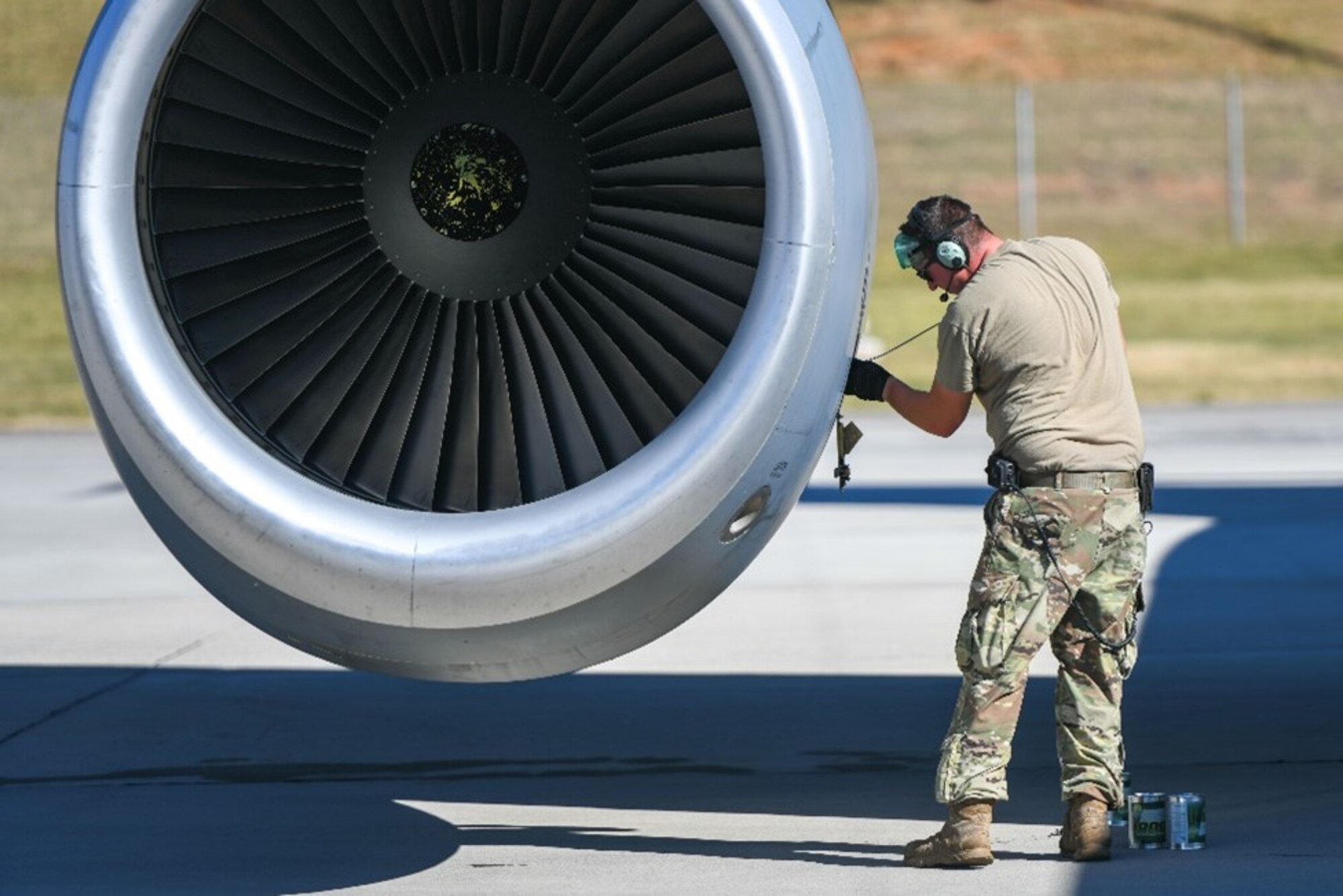 U.S. Air Force Airman from McGhee Tyson Air National Guard Base conduct hot-pit refueling during a 72-hour endurance mission for one of the KC-135 Stratotankers aircraft assigned to the 92nd Air Refueling Wing at McGhee Tyson Air National Guard Base, TN, Oct. 6, 2022. Each jet had two flying crew chiefs for support and utilized hot-pit crews at Fairchild AFB, McGhee Tyson ARB and March ARB. (U.S. Air Force photo by Airman 1st Class Jenna A. Bond)