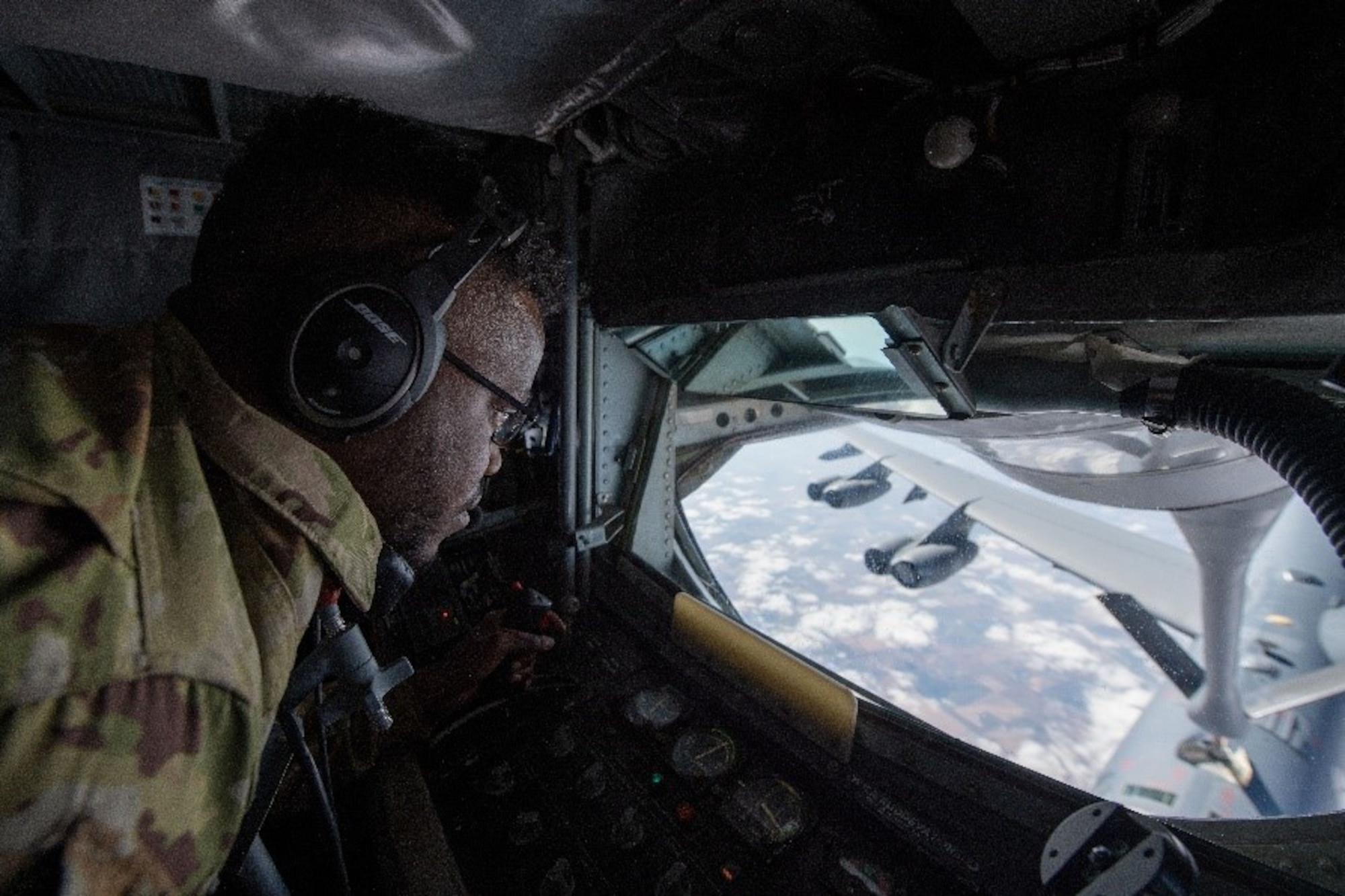 A U.S. Air Force boom operator from Fairchild Air Force Base refuels a B-52 Stratofortess from Minot Air Force Base, departing McGhee Tyson Air National Guard Base, for a 72-hour endurance mission Oct. 6, 2022. The endurance mission covered over 36,000 miles and included total force operational support from numerous units across the country. (U.S. Air Force photo by Airman 1st Class Jenna A. Bond)