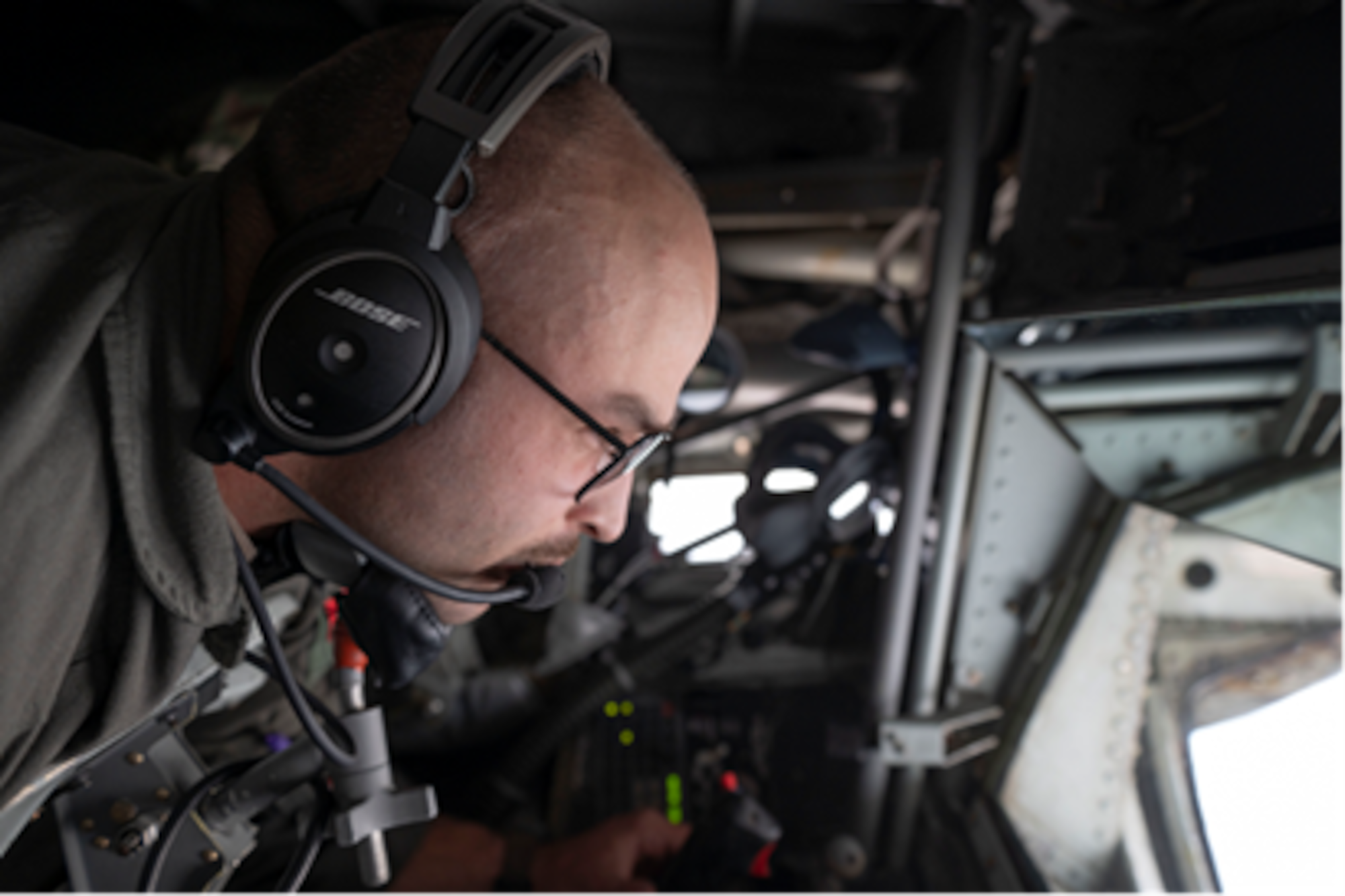 U.S. Air Force Tech Sgt. Grant Gerhart, 116th Air Refueling Squadron in-flight refueling specialists, prepares to fuel a B-2 Spirit bomber aircraft assigned to Whiteman Air Force Base, MO, Oct. 4, 2022. The B-2 was one of four aircraft refueled by a KC-135 Stratotanker from Fairchild AFB Wash., during a 72-hour endurance mission. (U.S. Air Force Photo by 2nd Lt. Ariana E. Wilkinson)