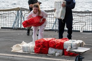 GULF OF OMAN (Oct. 2, 2022) Personnel from the United Kingdom’s Royal Navy frigate HMS Montrose (F236) inventory illicit drugs seized from a fishing vessel in international waters in the Gulf of Oman, Oct. 2.