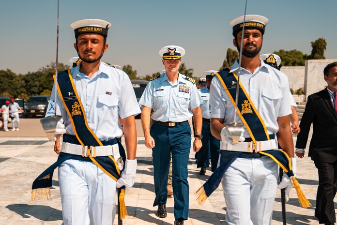 (221006-N-NO146-1002) KARACHI, Pakistan (Oct. 6, 2022) U.S. Coast Guard Capt. Eric Helgen, commodore for Patrol Forces Southwest Asia, is welcomed by members of the Pakistan Navy during a scheduled port visit, Oct. 6. Fast response cutters USCGC Charles Moulthrope (WPC 1141) and USCGC Emlen Tunnell (WPC 1145) visited Pakistan as part of an ongoing series of joint exercises and technical exchanges between U.S. 5th Fleet and the Pakistan Navy.