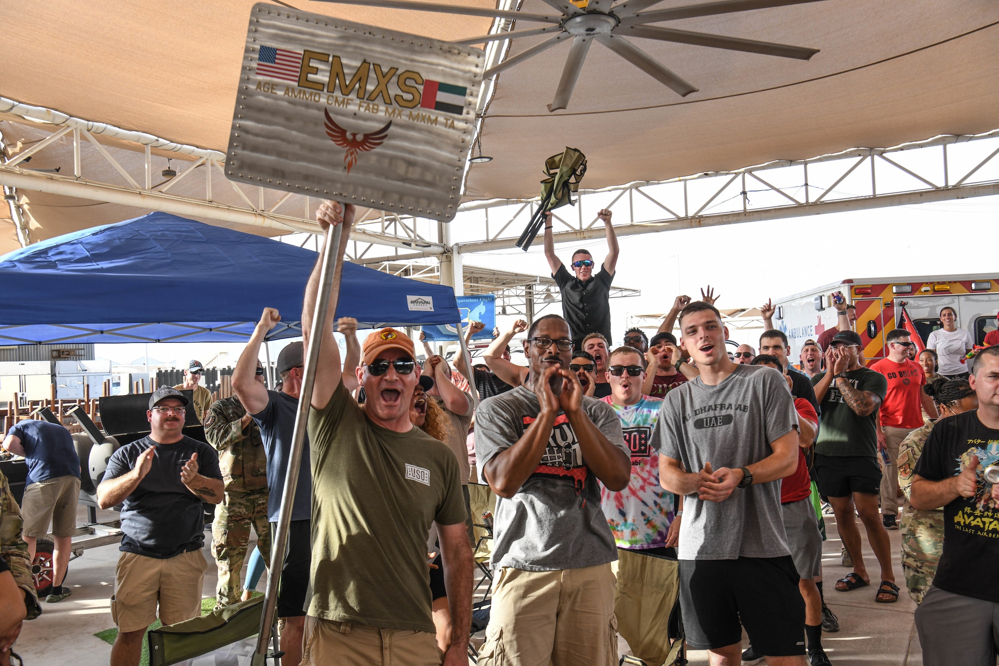 The 380th Air Expeditionary Wing celebrated their top performers during a quarterly awards ceremony at the Phantom Pavilion, October 4, 2022 at Al Dhafra Air Base, United Arab Emirates. Embracing the spirit of football season, the theme for the third quarter awards was a tailgating event. Airmen were encouraged to wear their favorite team’s jerseys and decorate their sections while they cheered on their Wingmen.