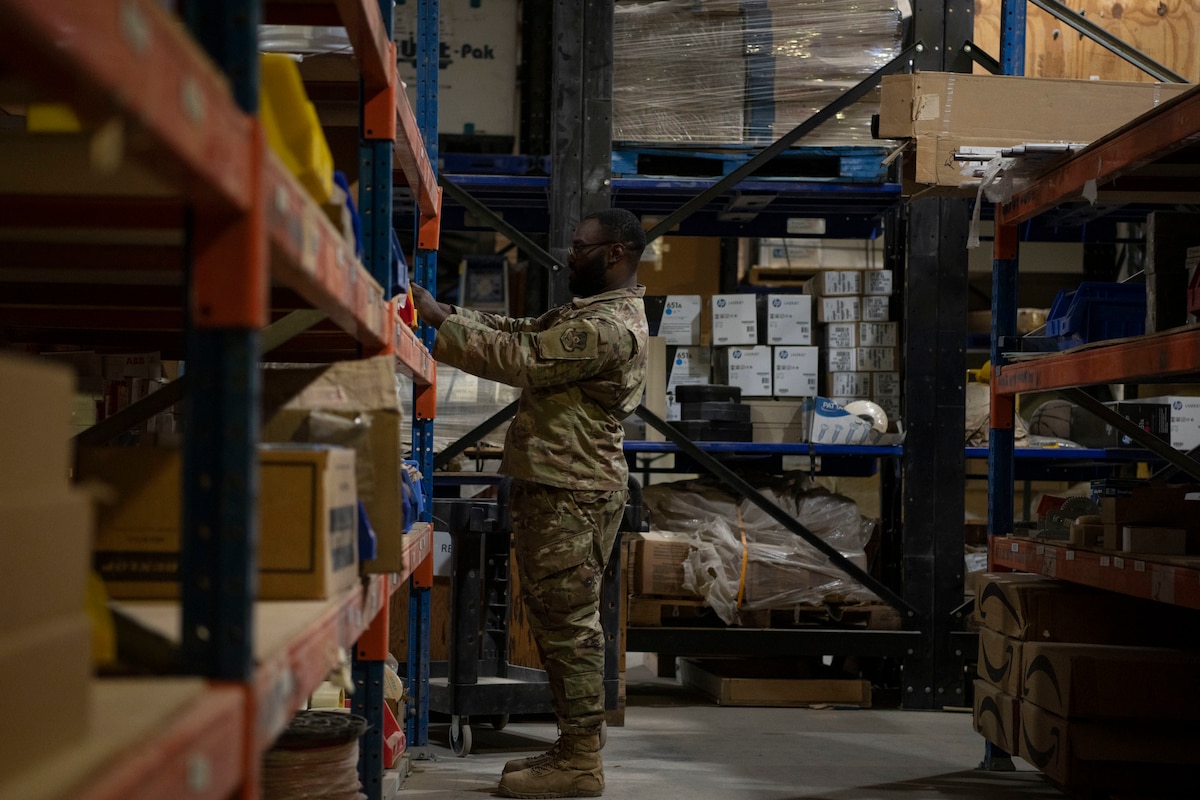 U.S. Air Force Senior Airman Cameron Walker, 386th Expeditionary Civil Engineer Squadron inventory technician, looks through equipment at the U-Fix It building on Ali Al Salem Air Base, Kuwait, September 15, 2022. The U-Fix-It store helps the mission by allowing the team to focus on more jobs by giving Airmen around base the means to fix those issues themselves. (U.S. Air Force photo by Staff Sgt. Ashley N. Mikaio)