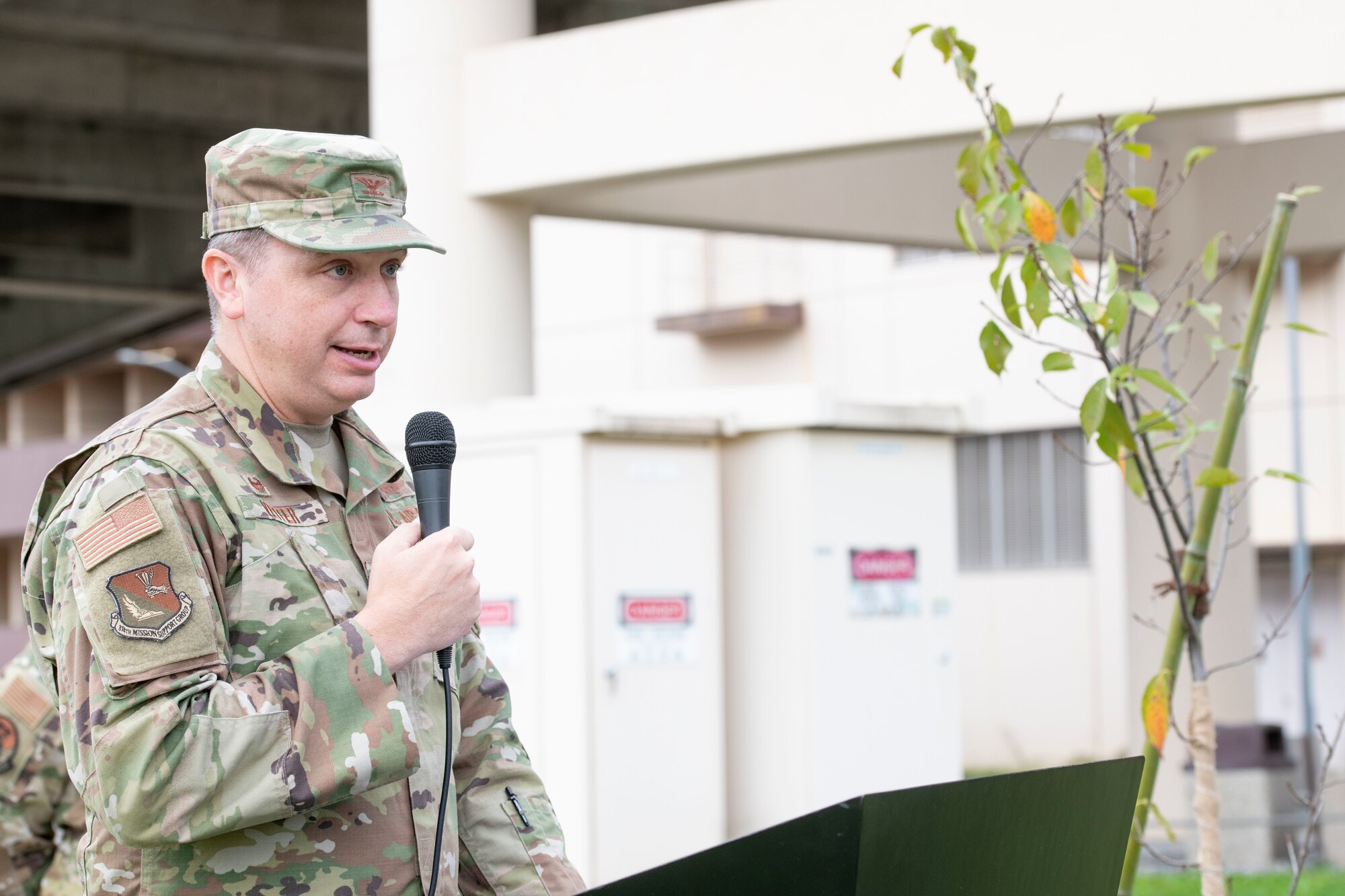 Col. Ryan Vetter, 374th Mission Support Group commander, gives remarks during a tree planting ceremony at Yokota Air Base, Japan, Oct. 5, 2022.